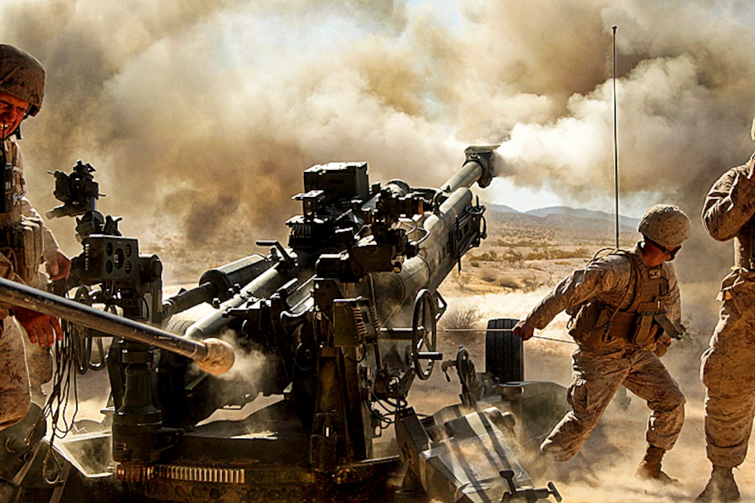 Marines fire an M777 A2 howitzer during a series of integrated exercises at the Combat Center’s Quakenbush Training Area in Twentynine Palms, Calif., April 26, 2013. The Marines are assigned to 5th Battalion, 14th Marine Regiment.  
