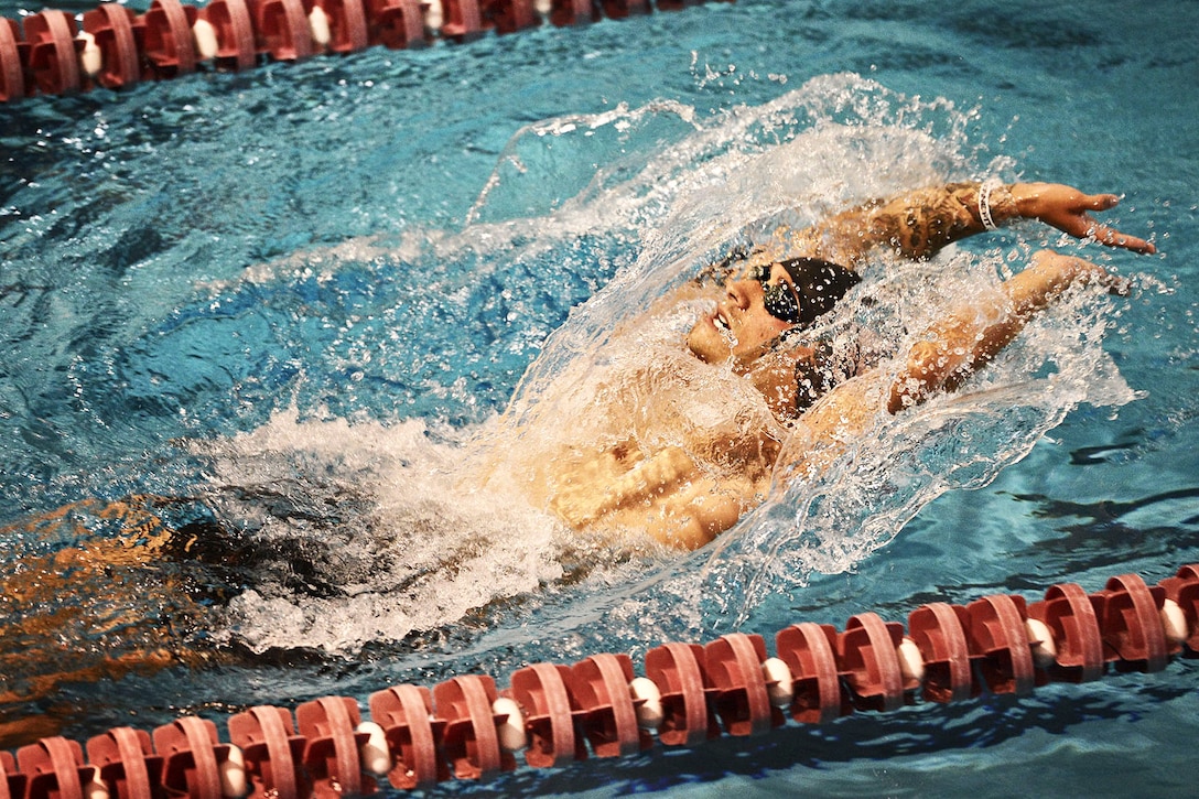 Marine Corps Cpl. Jonathan Ray practices his swimming techniques in Colorado Springs, Colo., May 2, 3013. Ray will compete during the 2013 Warrior Games, May 11-16, 2013.  
