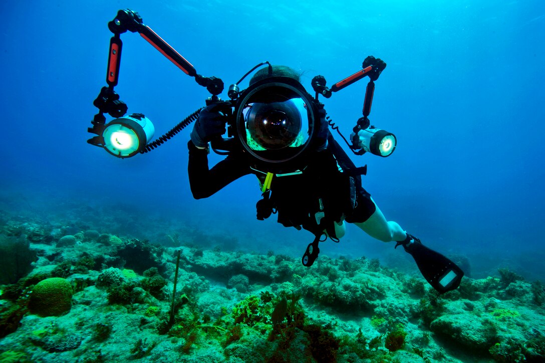 U.S. Navy Navy Petty Officer 2nd Class Kathleen Gorby conducts underwater photography training off the coast of Guantanamo Bay, Cuba, April 16, 2013. Gorby is a mass communication specialist. The Underwater Photo Team of Expeditionary Combat Camera conducts semi-annual training.  
