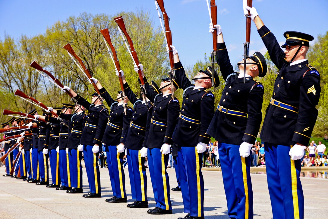 Members of the U.S. Army Drill Team, part of the 3d U.S. Infantry Regiment known as "The Old Guard," perform during an exhibition drill at the Lincoln Memorial in Washington, D.C., April 13, 2013. The soldiers spend hours a week perfecting each movement and routine.  
