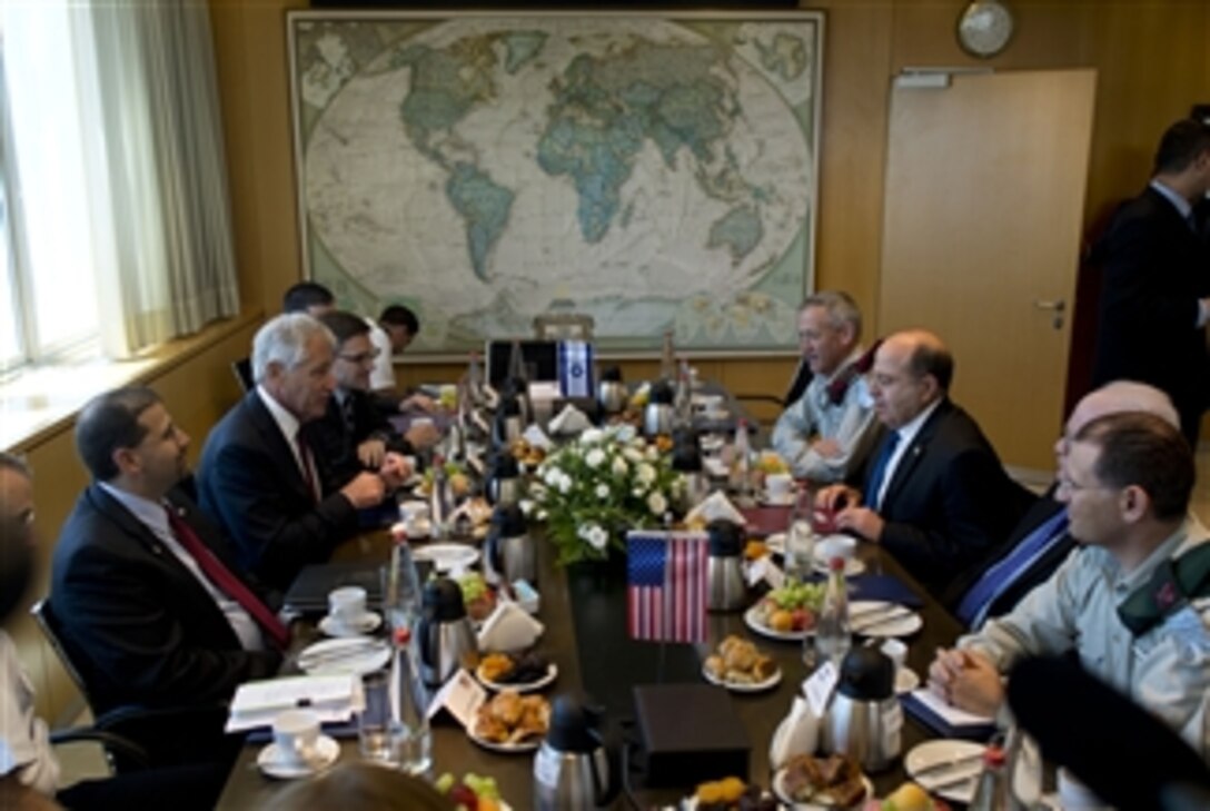U.S. Defense Secretary Chuck Hagel, left center, meets with Israeli Defense Minister Moshe Yaalon, right center, in Tel Aviv, Israel, May 15, 2014. Hagel met with the defense leader to discuss issues of mutual importance before he visited U.S. and Israeli troops in the area.