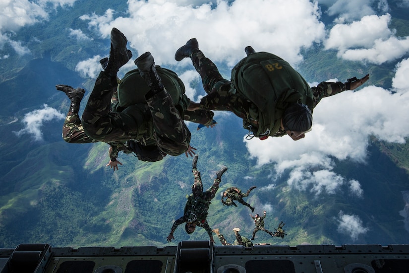 Soldiers jumping out of aircraft