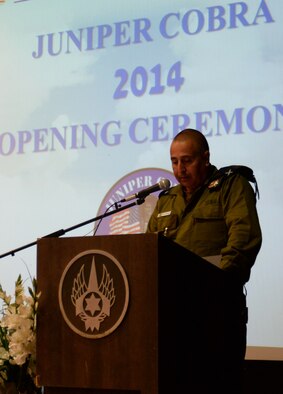 Israeli Defense Force Brig. Gen. Shachar Shohat speaks to a crowd of U.S. and Israeli service members during an opening ceremony for the Juniper Cobra 14 exercise May 15, 2014, at Hatzor Air Base, Israel.  The goal of JC14 is to exercise both nations' active missile defense forces and to improve their combined ability to defend against missile attacks. Shohat is the Air Defense Forces commander. (U.S. Air Force photo/Staff Sgt. Joe W. McFadden)