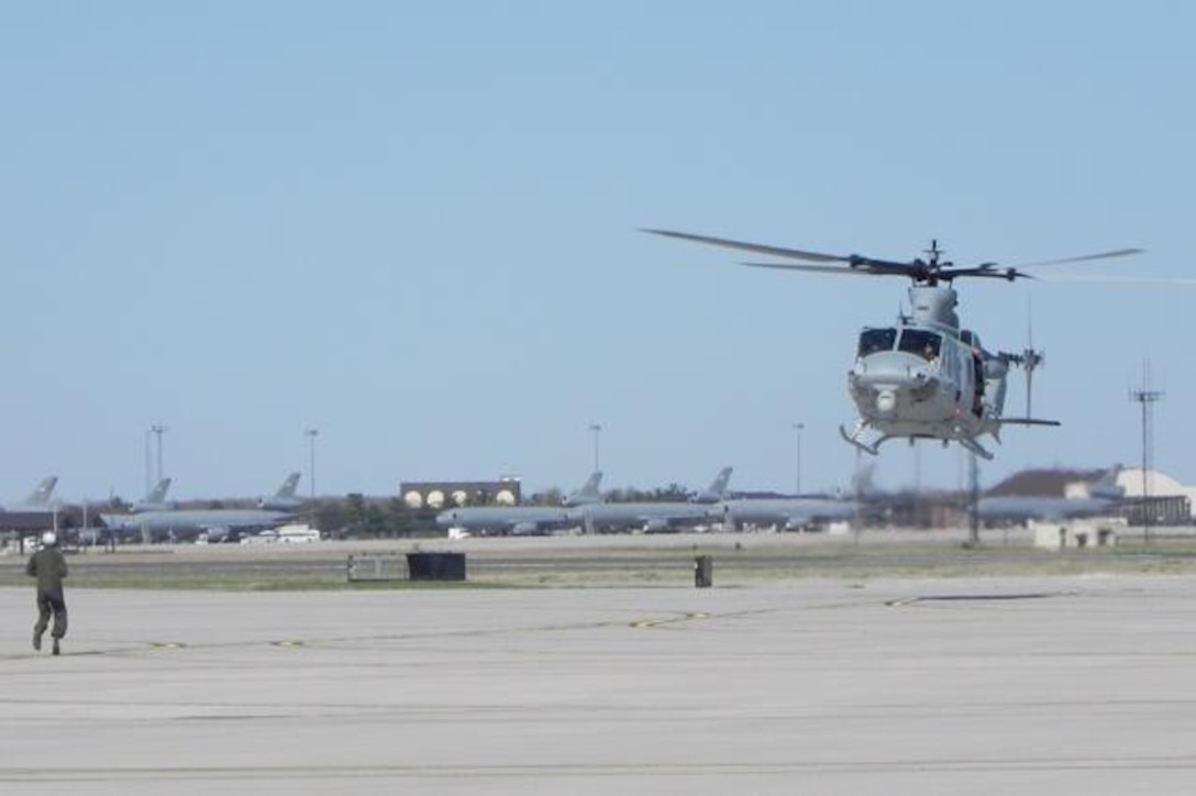 Capt. Sean Hicks, Defensive Contract Management Agency pilot; Capt. Daniel Turaj, Marine Light Attack Helicopter Squadron (HMLA) 773 pilot, and Gunnery Sgt. Jason Joly, DCMA crew chief, land the second UH-1Y Yankee to arrive at HMLA-773 April 25, 2014, at Joint Base McGuire-Dix-Lakehurst, N.J. HMLA-773 received a total of three Yankees at each of the squadron’s three detachments as part of a fleet upgrade from the UH-1N Huey.