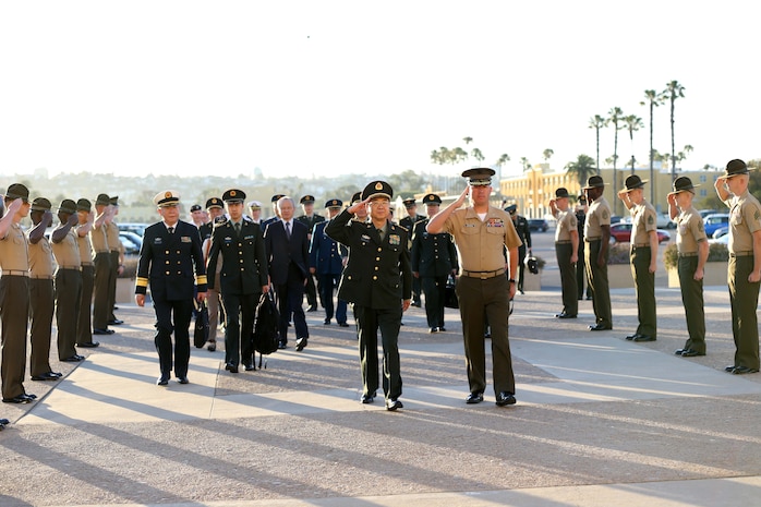 Gen. Fang Fenghui, chief of the general staff, People's Republic of China, renders a salute with Brig. Gen. James W. Bierman, Jr., commanding general, Marine Corps Recruit Depot San Diego and Western Recruiting Region. During Fang's May 14 visit aboard the depot, he watched recruits march, perform rifle manual in their squad bays and witnessed recruits train at the bayonet assault course. There were approximately 22 other visitors from the People's Republic of China who accompanied Fang and were able to view the making of Marines at the depot.  Bierman guided Fang through the entirety of his
visit and gave detailed answers to all questions pertaining to the Marine Corps and the depot.