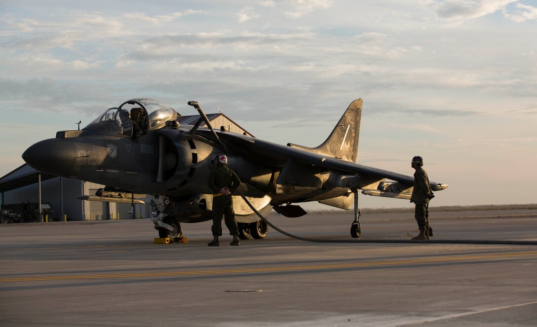 Marines with Marine Wing Support Squadron 371 refuel an AV-8B Harrier with Marine Attack Squadron 214, at the new Auxiliary Landing Field (ALF) facility at MCAS Yuma, Ariz., Feb. 24. The new facility is bidirectional, eliminating crosswinds for landing aircraft. ALF is a facility designed to have support personnel available to resupply water and refuel aircraft.  