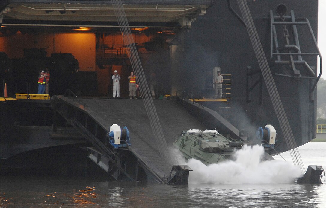 Assault amphibious vehicle operations were successfully conducted in the slipway at the Blount Island Command in Jacksonville, Fla., Thursday.  A total of nine AAVs splashed from Bobo Class Ship USNS PFC Dewayne T. Williams, marking the first time since 1999 that tracks have splashed from a Maritime Prepositioning Force ship.  The objective of the AAV operation was to demonstrate and evaluate the operational capability to launch AAVs from an MPF ship.  The objective was fully achieved.  Another AAV operation on a much larger scale is planned during the month of August.

