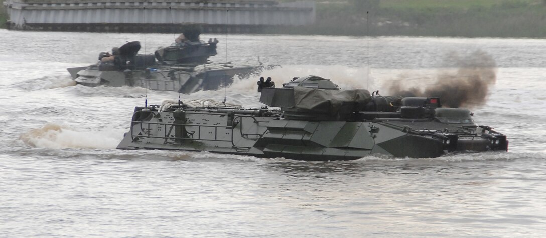 Assault amphibious vehicle operations were successfully conducted in the slipway at the Blount Island Command in Jacksonville, Fla., May 15.  A total of nine AAVs splashed from Bobo Class Ship USNS PFC Dewayne T. Williams, marking the first time since 1999 that tracks have splashed from a Maritime Prepositioning Force ship.  The objective of the AAV operation was to demonstrate and evaluate the operational capability to launch AAVs from an MPF ship.  The objective was fully achieved.  Another AAV operation on a much larger scale is planned during the month of August.
