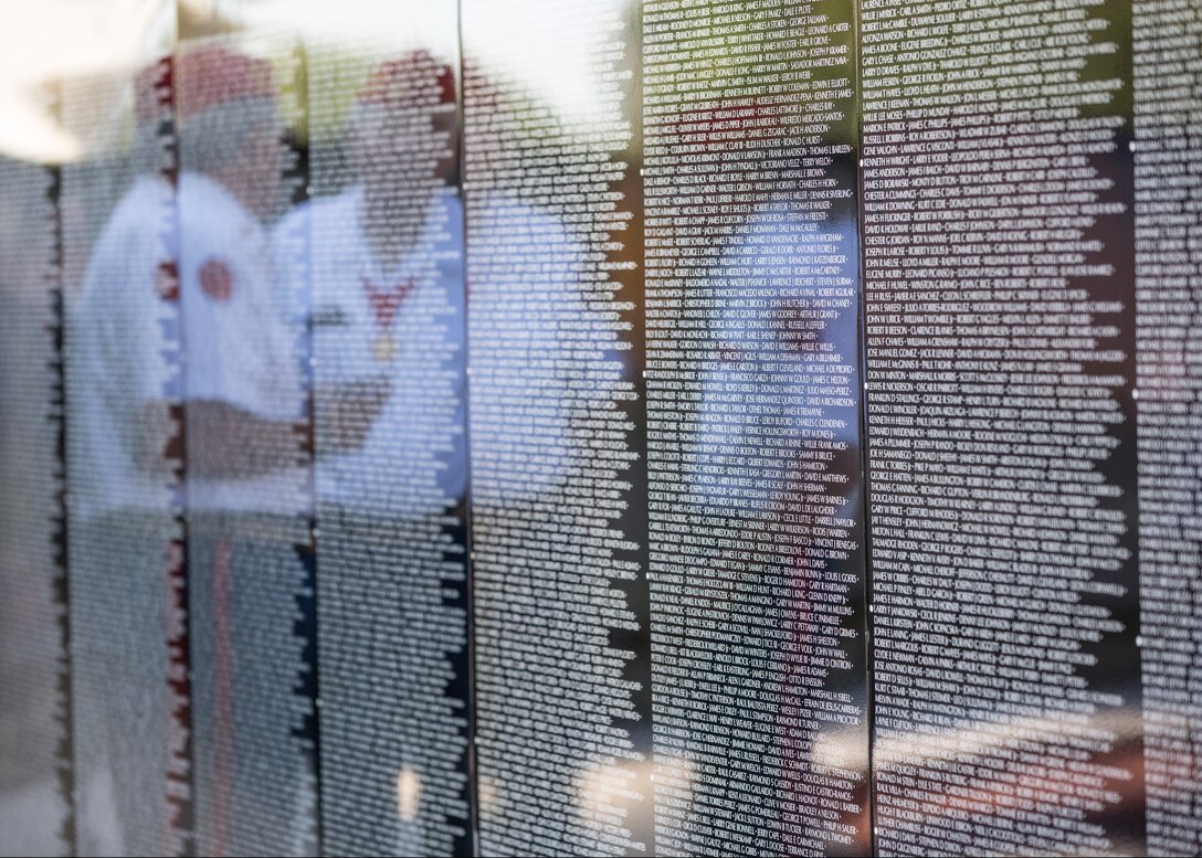 A mobile one half-replica of the Vietnam Veterans Memorial Moving Wall is displayed at Veterans Park in Kenner, Louisiana during a Vietnam War Memorial ceremony, May 16, 2014. Marines of Marine Forces Reserve and veterans from all branches of the Armed Forces helped honor the fallen and those still missing from the Vietnam War by providing a band and rifle team to commemorate the ceremony. Vietnam veterans built the moving wall replica and it has been traveling the country for more than 30 years.