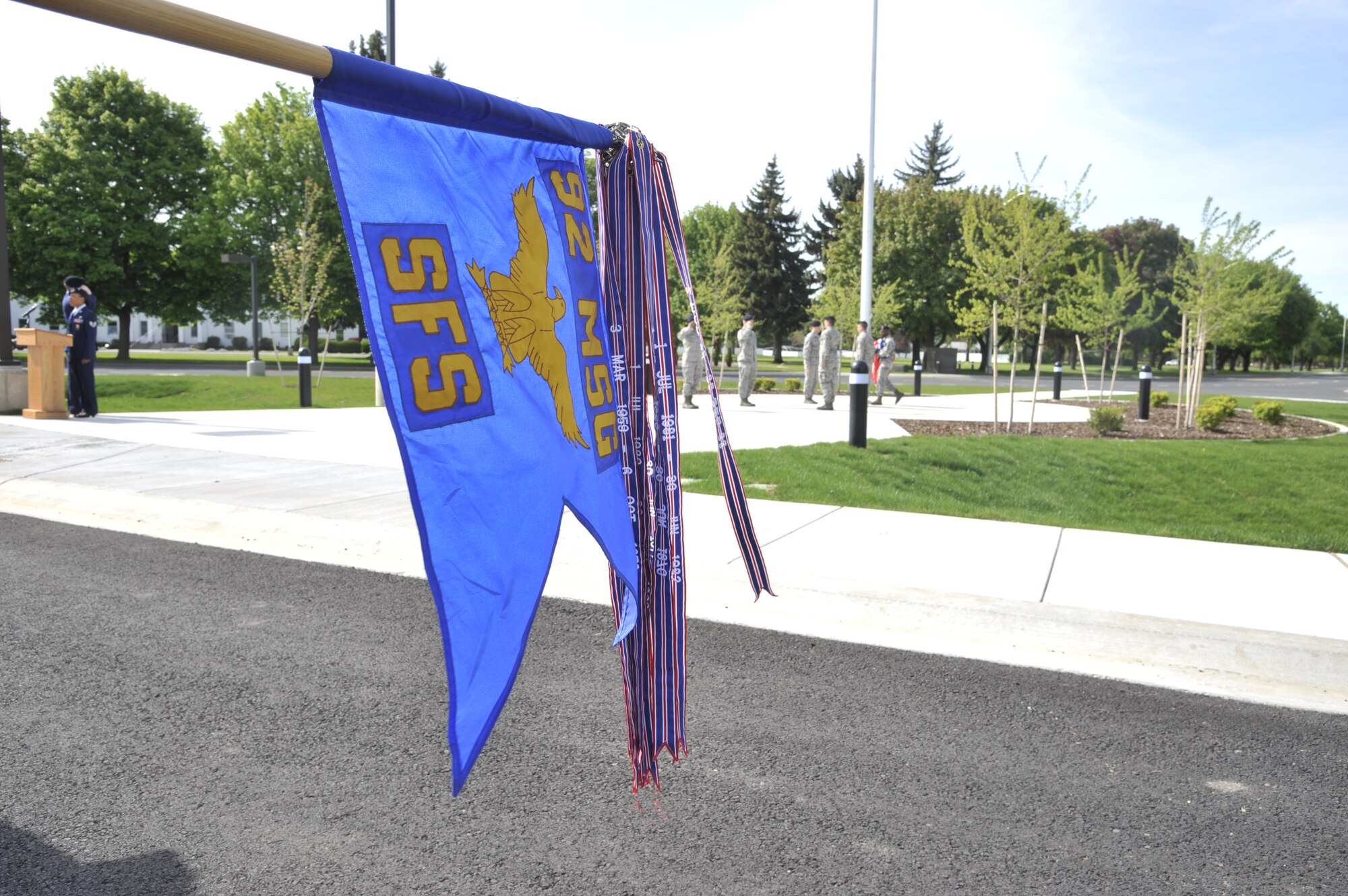 Airmen from the 92nd Security Forces Squadron prepare to perform ceremonial retreat functions to conclude events held during National Police Week at Fairchild Air Force Base, Wash., May 15, 2014. This week recognizes the service and sacrifice of U.S. law enforcement officers who lost their lives ensuring America's safety and protection. (U.S. Air Force photo by Senior Airman Mary O'Dell/Released)