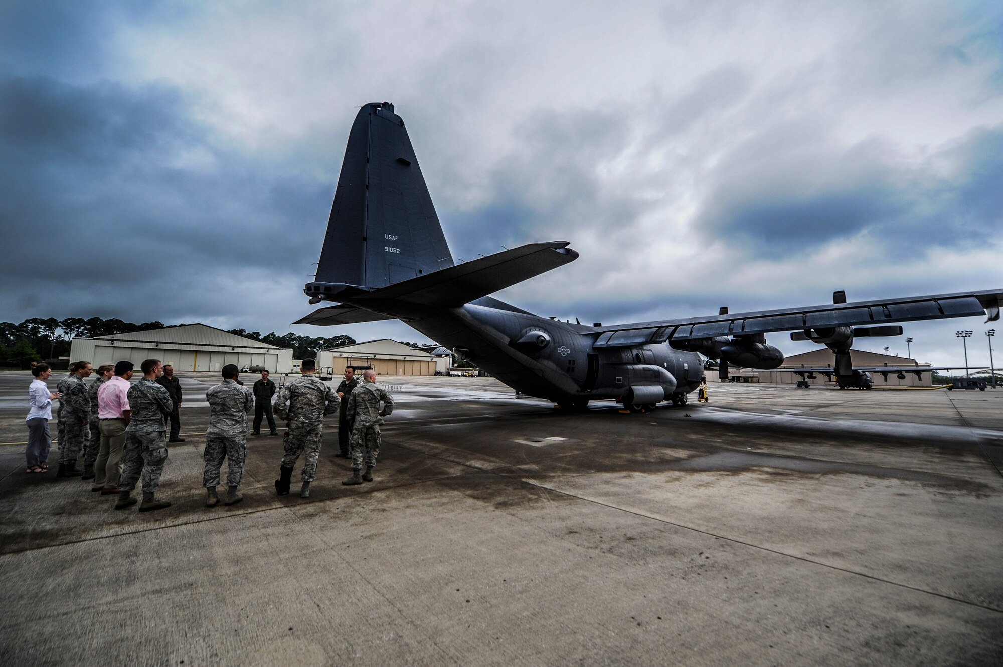 The Air Force Special Operations Command Outstanding Airmen and Civilian of the Year recipients tour the AC-130U Spooky Gunship on Hurlburt Field, Fla., May 13, 2014. The OACY recipients spent two days touring Hurlburt Field and were honored during a ceremony held at the Soundside club. (U.S. Air Force photo/Senior Airman Christopher Callaway)