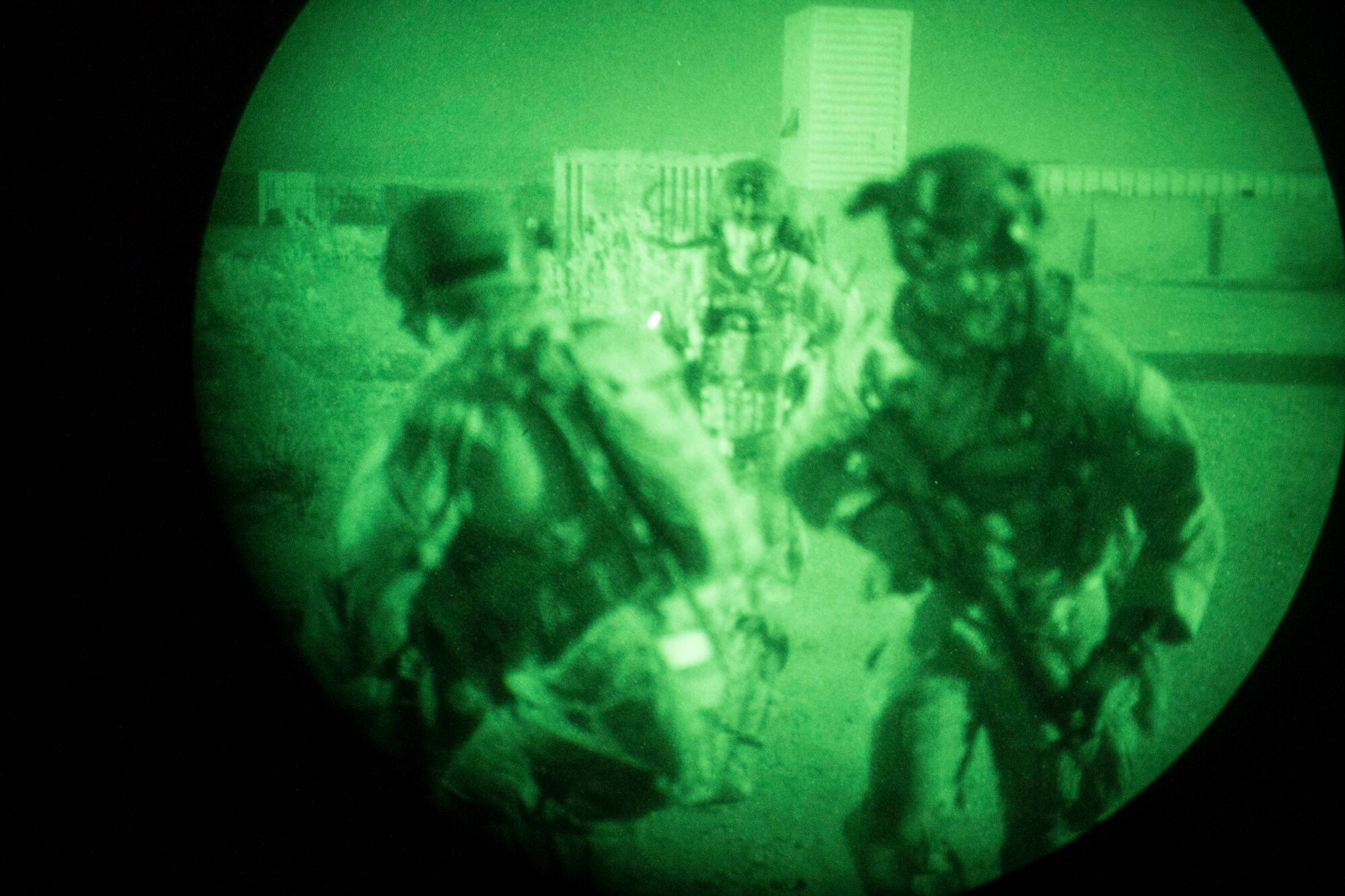 Rescue forces board an Arizona Army National Guard 2-285 UH-60 Black Hawk helicopter, following a training mission in Exercise ANGEL THUNDER on May 14, 2014 at the Florence Military Reservation, Ariz. ANGEL THUNDER 2014 is the largest and most realistic joint service, multinational, interagency combat search and rescue exercise designed to provide training for personnel recovery assets using a variety of scenarios to simulate deployment conditions and contingencies. Personnel recovery forces will train through the full spectrum of personnel recovery capabilities with ground recovery personnel, air assets, Special Forces teams and federal agents. (U.S. Air Force photo by Maj. Sarah Schwennesen/Released)