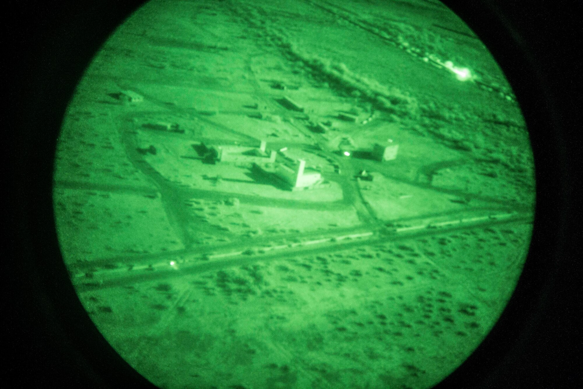 An Arizona Army National Guard 2-285 UH-60 Black Hawk helicopter conducts aerial command and control during a training mission in Exercise ANGEL THUNDER on May 14, 2014 at the Florence Military Reservation, Ariz. ANGEL THUNDER 2014 is the largest and most realistic joint service, multinational, interagency combat search and rescue exercise designed to provide training for personnel recovery assets using a variety of scenarios to simulate deployment conditions and contingencies. Personnel recovery forces will train through the full spectrum of personnel recovery capabilities with ground recovery personnel, air assets, Special Forces teams and federal agents. (U.S. Air Force photo by Maj. Sarah Schwennesen/Released)