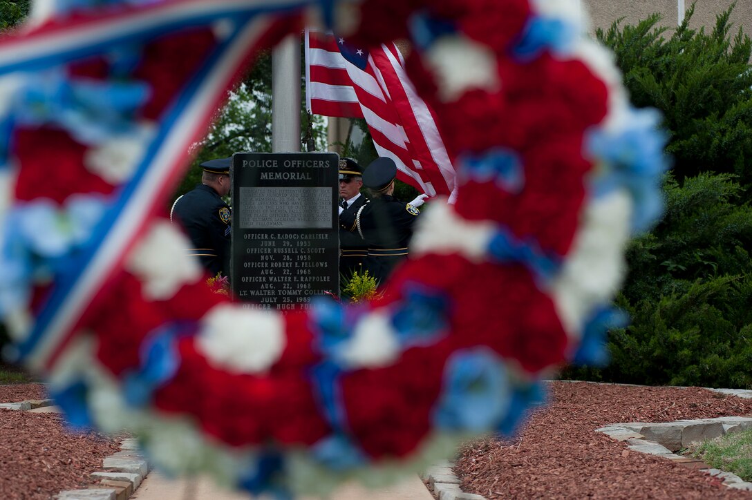 The 82nd Security Forces Squadron was present at a commemoration ceremony in downtown Wichita Falls May 12, 2014, along with local, state and municipal police to honor National Police Week. In 1962, President John F. Kennedy signed a proclamation designating May 15th as Peace Officers Memorial Day and the week in which that date falls as Police Week. (U.S. Air Force photos by Airman 1st Class Jelani Gibson)