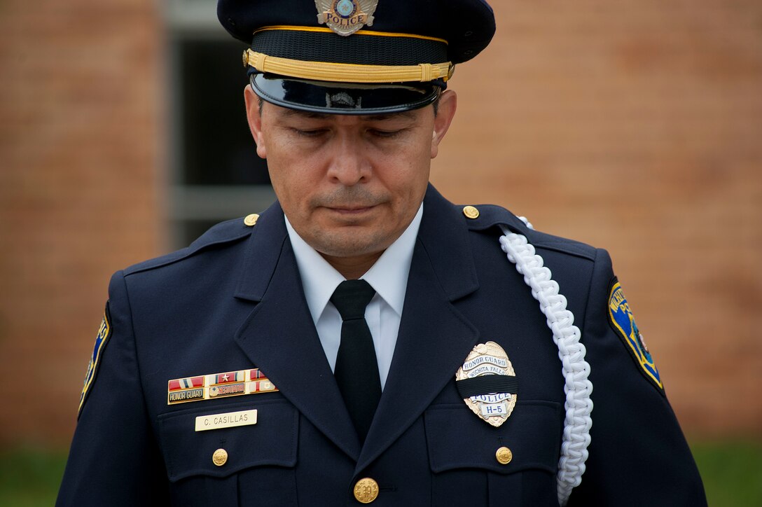 The 82nd Security Forces Squadron was present at a commemoration ceremony in downtown Wichita Falls May 12, 2014, along with local, state and municipal police to honor National Police Week. In 1962, President John F. Kennedy signed a proclamation designating May 15th as Peace Officers Memorial Day and the week in which that date falls as Police Week. (U.S. Air Force photos by Airman 1st Class Jelani Gibson)