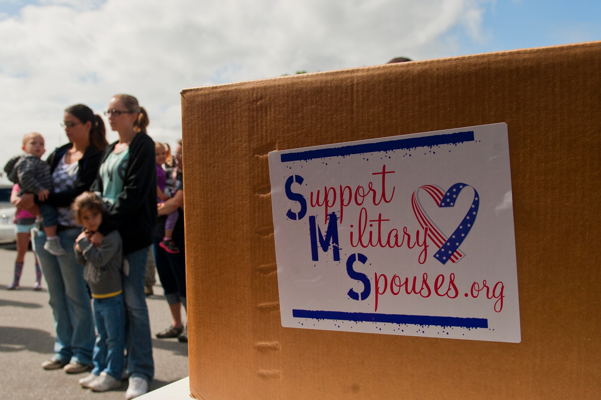 Team Seymour spouses were celebrated during a Shoeboxes for Military Spouses event, May 16, 2014, in Goldsboro, North Carolina. Approximately 500 shoeboxes filled with gifts were distributed to Seymour Johnson military spouses. Support Military Spouses is a private organization dedicated to supporting the wives and husbands of service members. (U.S. Air Force photo/Airman 1st Class Brittain Crolley)