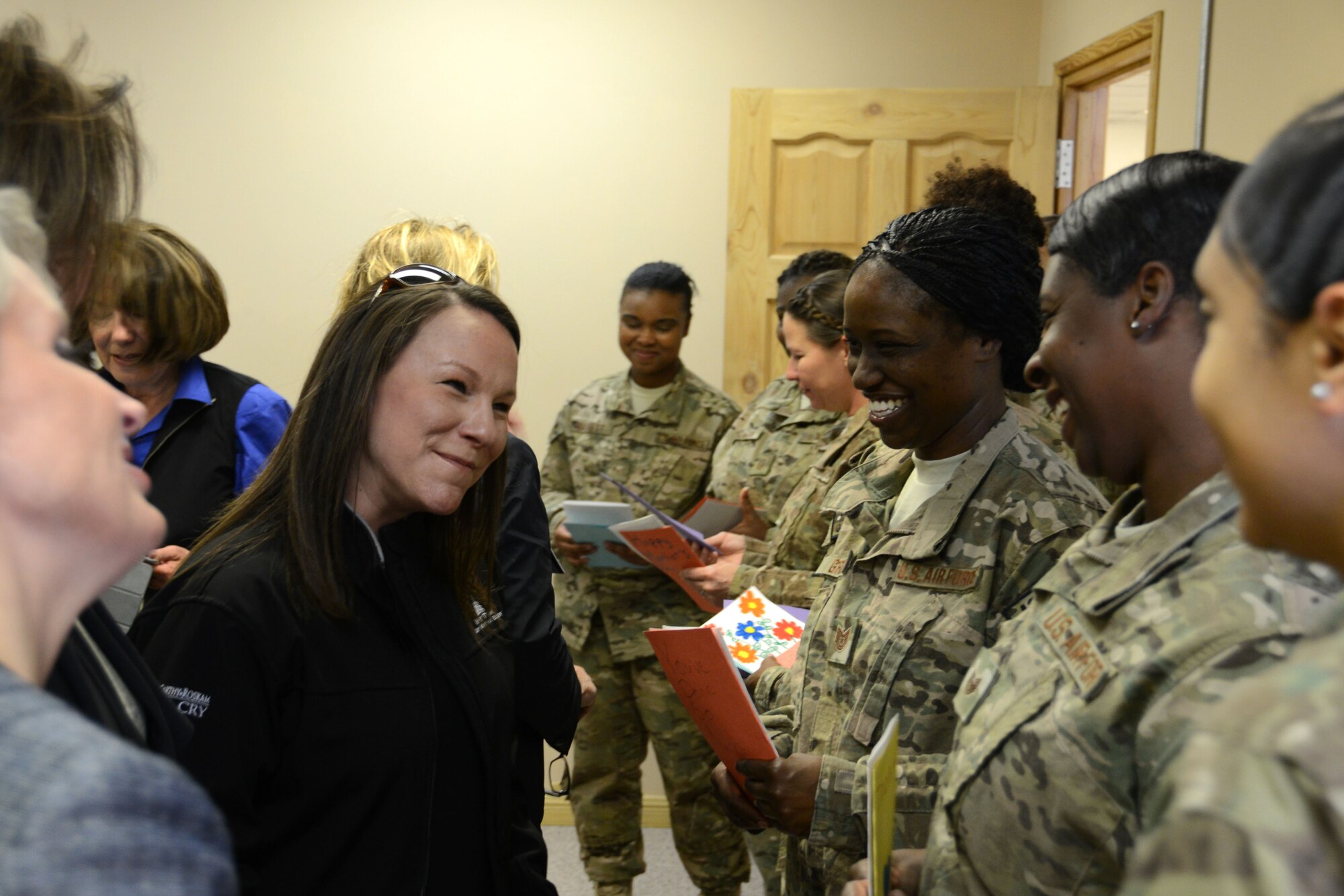 BAGRAM AIRFIELD, Afghanistan – Martha Roby (Ala.), House of Appropriations Committee, shares a light moment with deployed mothers from the 187th Fighter Wing, Montgomery, Ala. during their visit to Afghanistan May 12, 2014. Roby, a native of Alabama is a member of an annual Mother’s Day congressional delegation that visits Afghanistan to check the well-being and quality of life of American and Afghan women serving in the military. (U.S. Air Force photo by Master Sgt. Cohen A. Young)