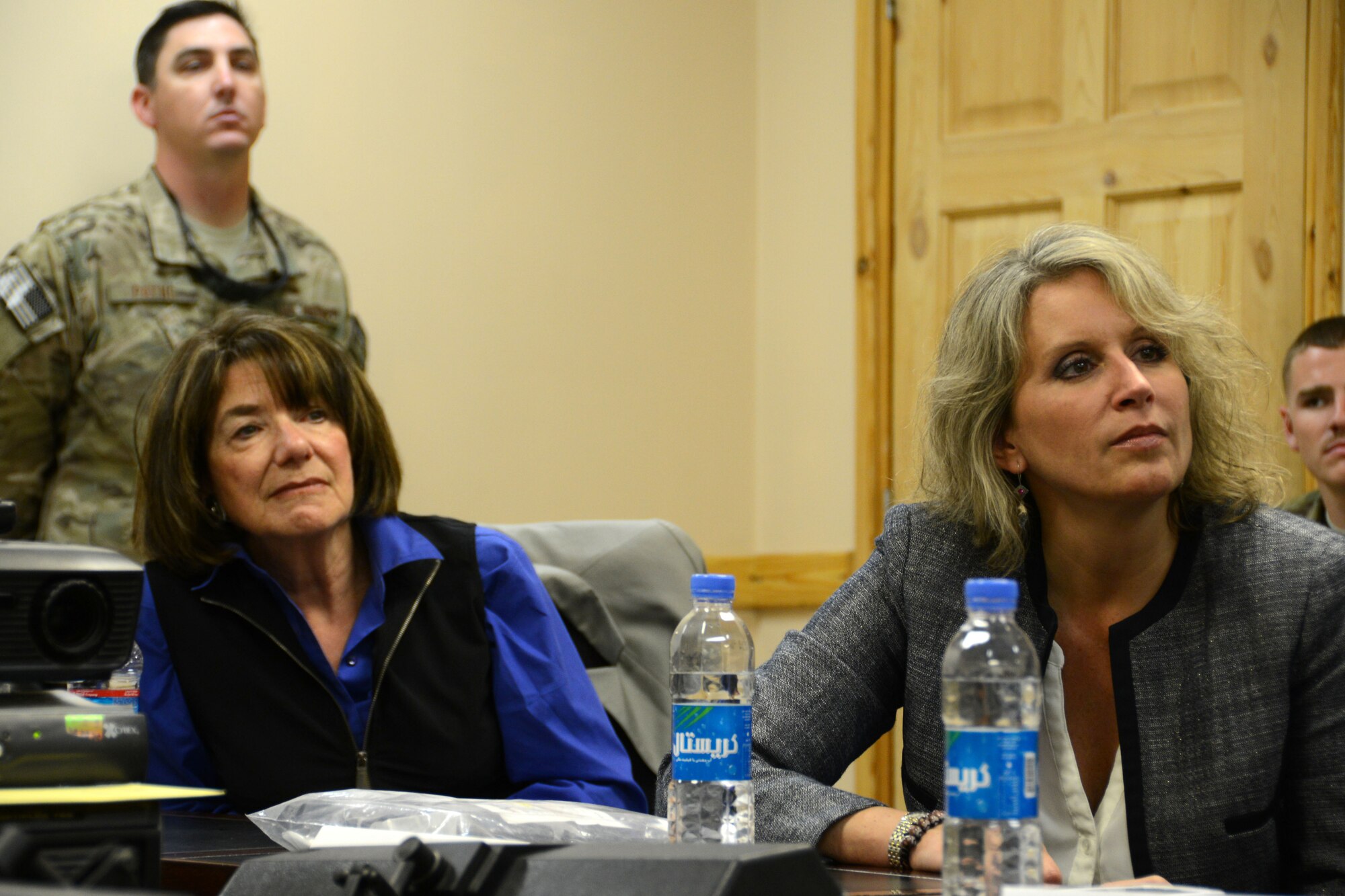 BAGRAM AIRFIELD, Afghanistan – Rep. Susan Davis (Calif.) and Rep. Renee Ellmers (N.C.) listen to briefings Alabama Guardsmen deployed from the 187th Fighter Wing, Montgomery, Ala. during their visit to Afghanistan May 12, 2014. The delegation traveled to Afghanistan to check on the climate of the ANG along with the mission and challenges at Bagram. (U.S. Air Force photo by Master Sgt. Cohen A. Young)