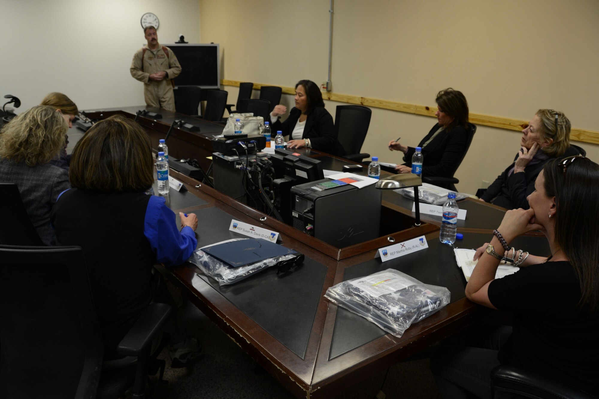 BAGRAM AIRFIELD, Afghanistan - Lt. Col Ryan Barker, 100th Expeditionary Fighter Squadron commander briefs the congressional delegation comprised of U. S. Reps. Martha Roby (Ala.), House of Appropriations Committee; Susan Davis (Calif.), House of Armed Services Committee; Niki Tsongas (Mass.), House of Armed Services Committee; Renee Ellmers (N.C.), Energy & Commerce Committee; Cheri Bustos (Ill.), Agriculture; Transportation & Infrastructure; Ms. Debra Wada, professional staff member; Ms. Jaime Cheshire, professional staff member and Maj. Janine Garner, U. S. Marine Corps service escort during their visit to Bagram Airfield, Afghanistan May 12. The delegation traveled to Afghanistan to check on the current climate of the ANG along with the mission and challenges at Bagram. (U.S. Air Force photo by Master Sgt. Cohen A. Young)