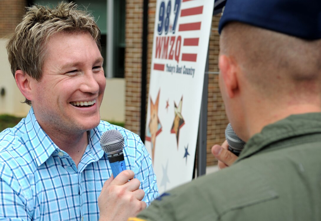 Boxer, a WMZQ radio station DJ,  interviews Col. Bill Knight, 11th Wing commander, during radio station WMZQ’s Military Appreciation Week at Joint Base Andrews, Md., May 15, 2014. (U.S. Air Force photo/Airman 1st Class Ryan J. Sonnier)