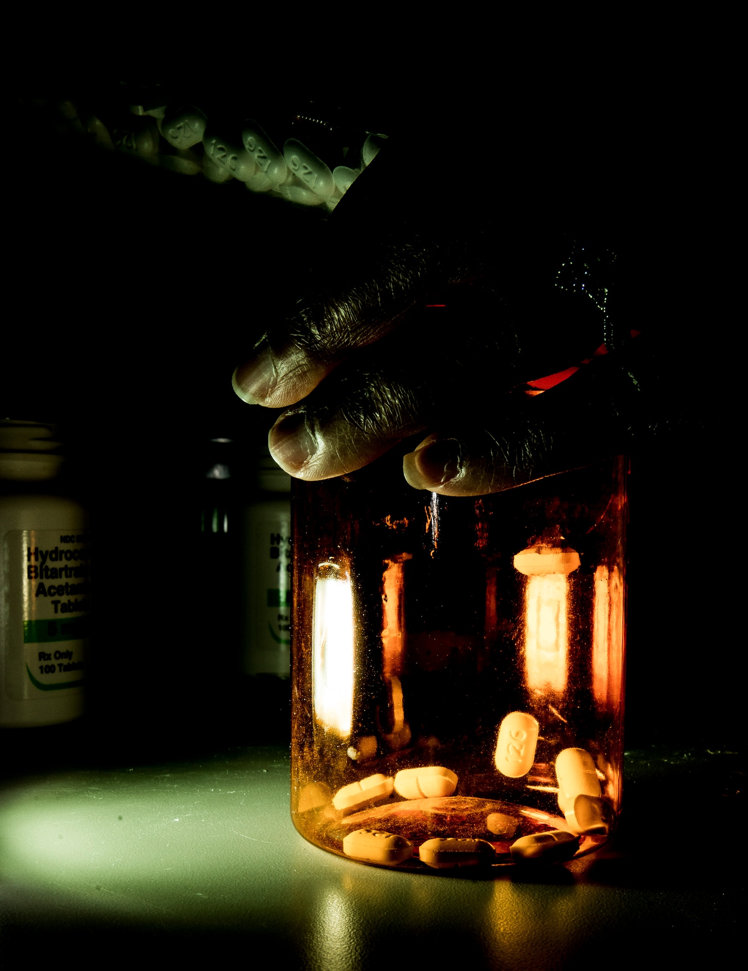 Tech. Sgt. Rikkieta Jones, 628th Medical Group pharmacy technician, fills a prescription bottle May 15, 2014, at Joint Base Charleston, S.C. The pharmacy technicians fill prescriptions for active duty, reservists, retirees and dependents of military members. (U.S. Air Force photo/ Senior Airman Dennis Sloan)