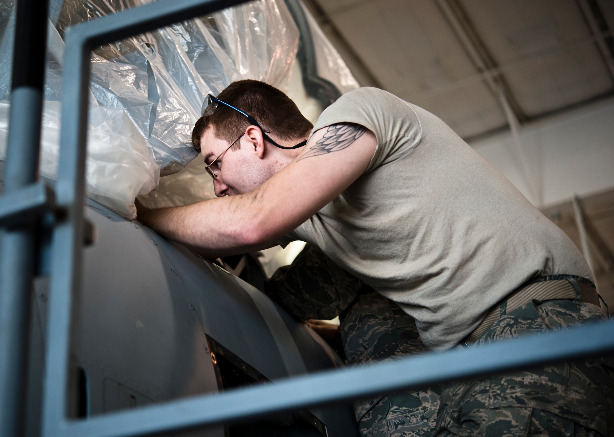 Senior Airman Daniel Hensley, 442nd Aircraft Maintenance Squadron electro-environmental technician from Sedalia, Missouri, performs maintenance work on an A-10 Thunderbolt II, May 15, 2014 at Whiteman Air Force Base, Missouri. Electro-environment technicians are responsible for performing and supervising aircraft electrical and environmental functions and activities. (U.S. Air Force photo by Senior Airman Daniel Phelps/Released)