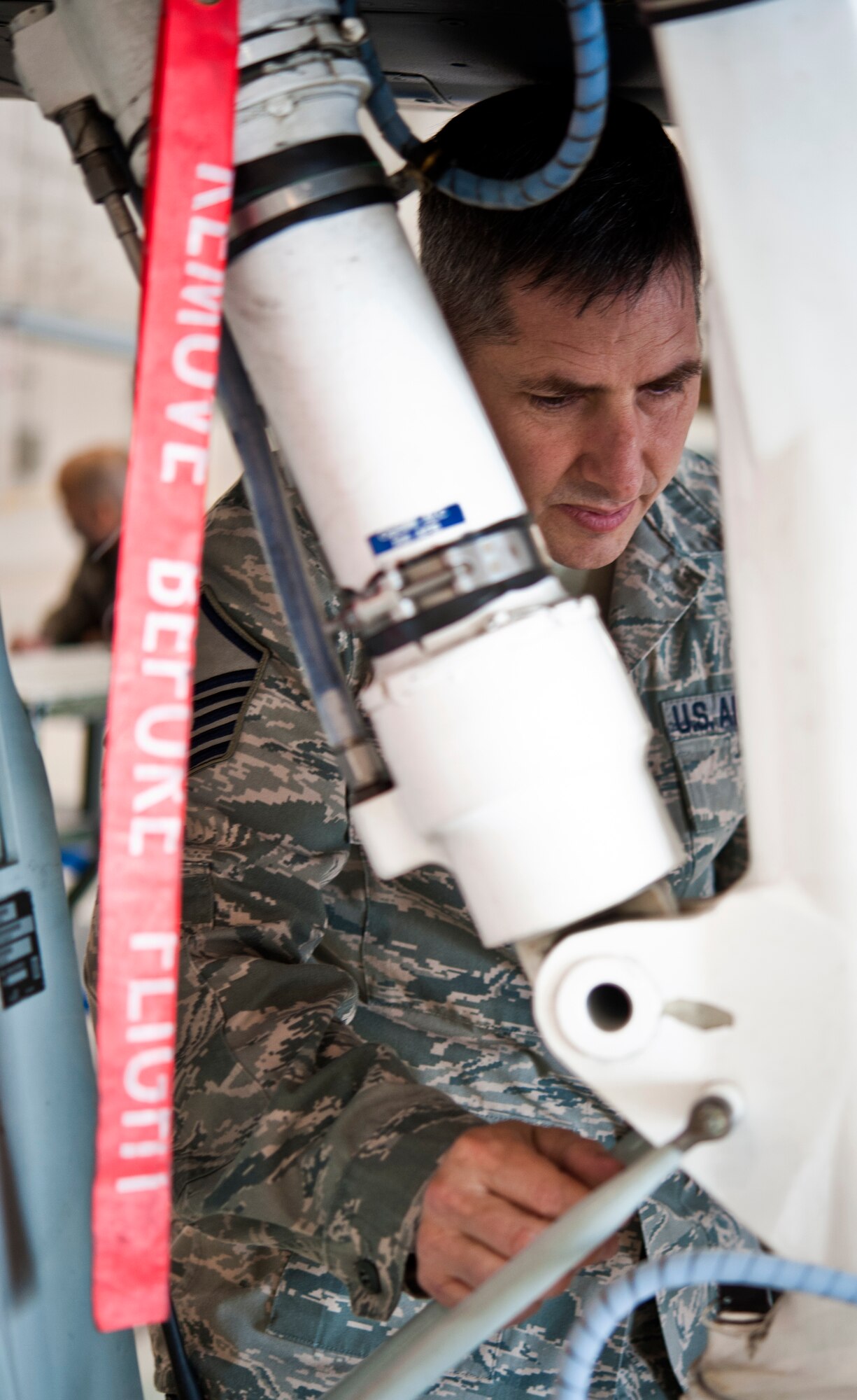 Master Sgt. Richard Hoff, 442nd Aircraft Maintenance Squadron electro-environmental technician from Sibley, Missouri, performs maintenance work on an A-10 Thunderbolt II, May 15, 2014 at Whiteman Air Force Base, Missouri. Electro-environment technicians are responsible for performing and supervising aircraft electrical and environmental functions and activities. (U.S. Air Force photo by Senior Airman Daniel Phelps/Released)