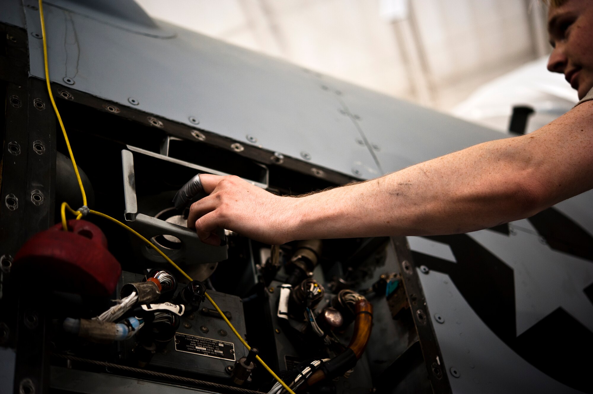 Senior Airman Dane Jorgensen, 442nd Aircraft Maintenance Squadron electro-environmental technician from New Baden, Illinois, performs maintenance work on an A-10 Thunderbolt II, May 15, 2014 at Whiteman Air Force Base, Missouri. Electro-environment technicians are responsible for performing and supervising aircraft electrical and environmental functions and activities. (U.S. Air Force photo by Senior Airman Daniel Phelps/Released)