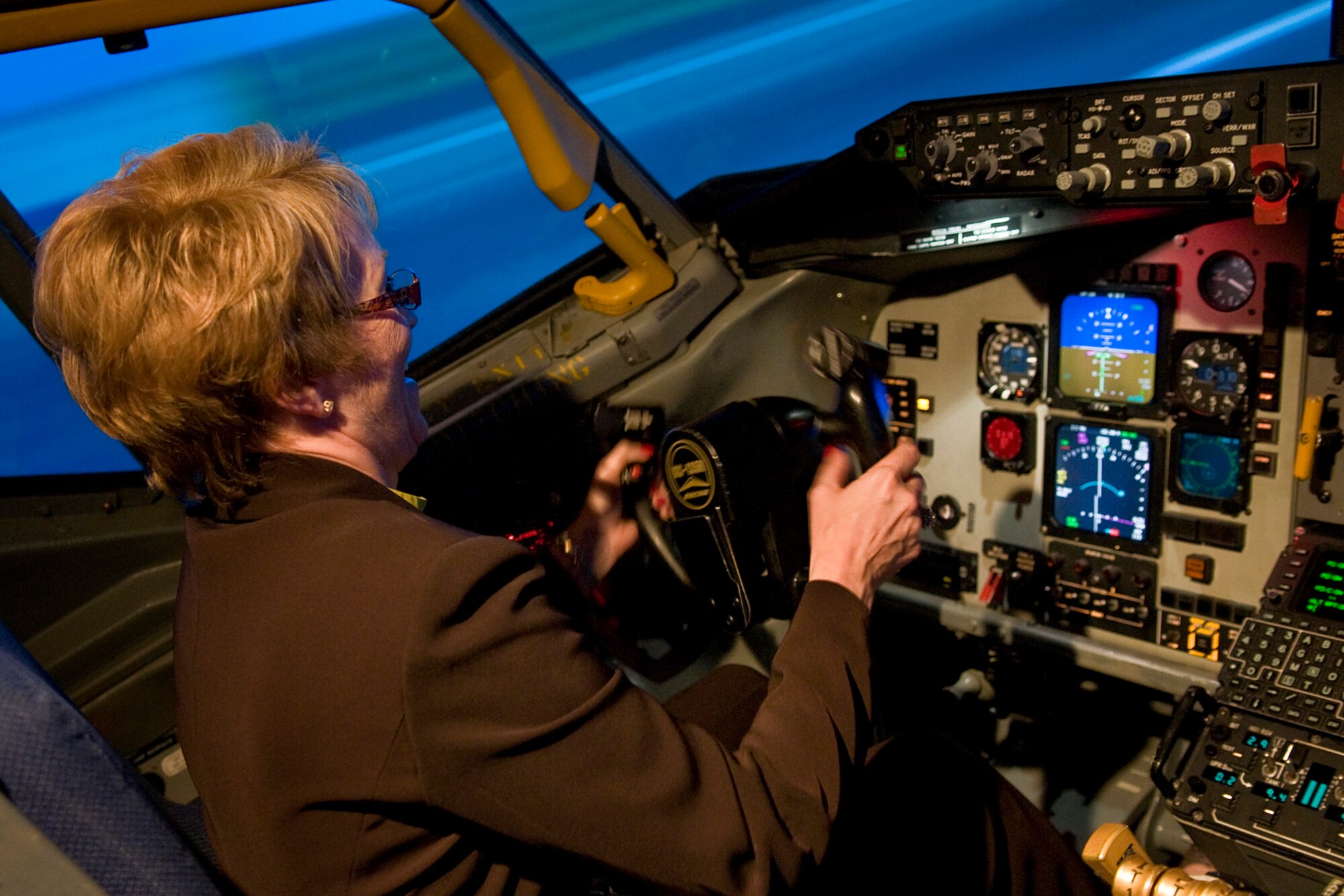 Indiana Lt. Gov. Sue Ellspermann is all smiles as she controls a simulated KC-135R Stratotanker aircraft at Grissom Air Reserve Base, Ind., May 14, 2014. Ellspermann, along with her staff and staff from U.S. Rep. Jackie Walorski's office, visited Grissom to learn more about the base and its role in both national defense and the Indiana economy. (U.S. Air Force photo/Tech. Sgt. Mark R. W. Orders-Woempner)
