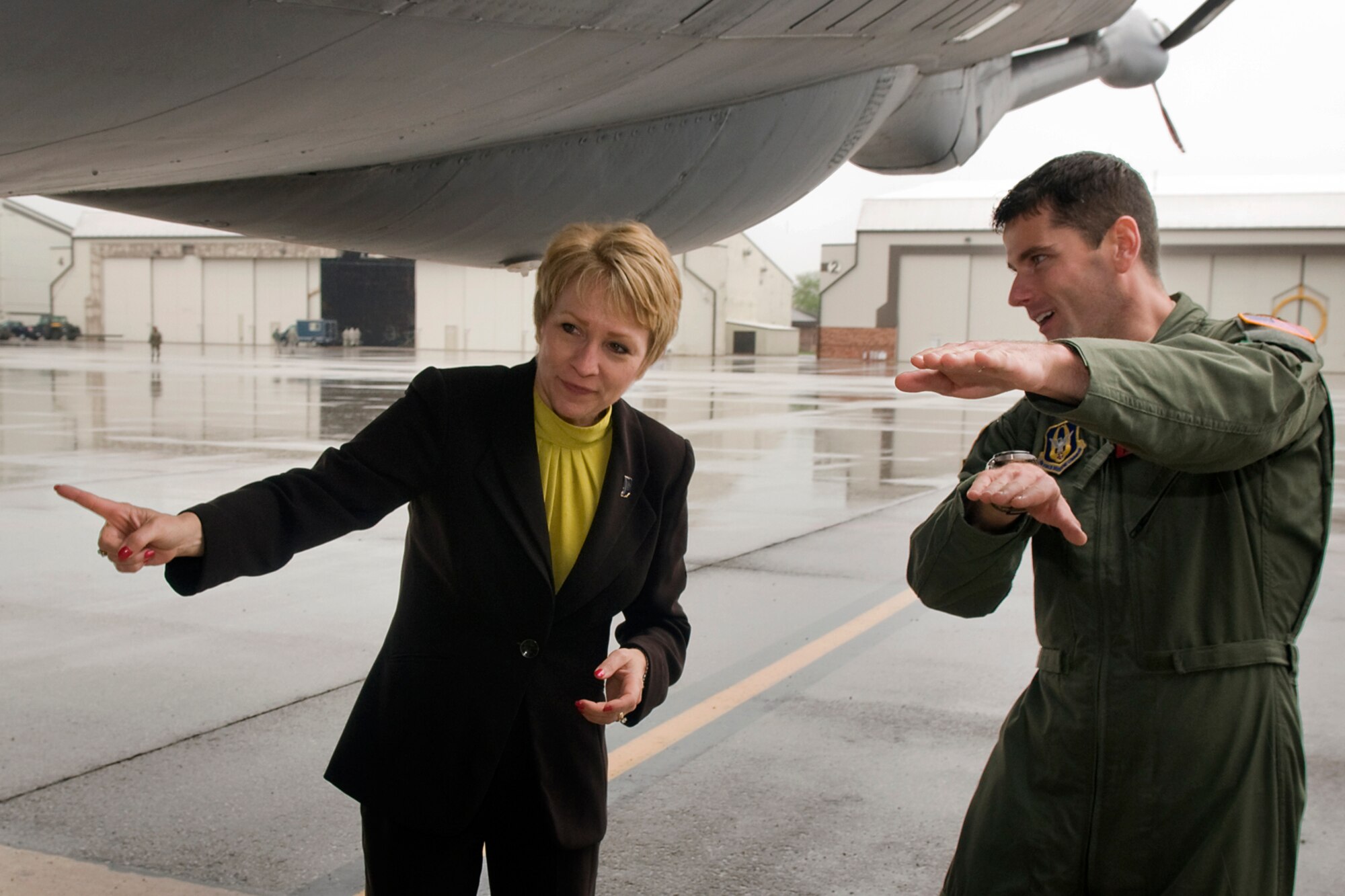 Indiana Lt. Gov. Sue Ellspermann, left, talks with 2nd Lt. Brandon Giles, 74th Air Refueling Squadron pilot, about aerial refueling operations at Grissom Air Reserve Base, Ind., May 14, 2014. Ellspermann, who earned her master's degree and doctorate in industrial engineering at the University of Louisville, Ky., was able to dig deep into the technical aspects of aerial refueling with 434th Air Refueling Wing pilots. (U.S. Air Force photo/Tech. Sgt. Mark R. W. Orders-Woempner)
