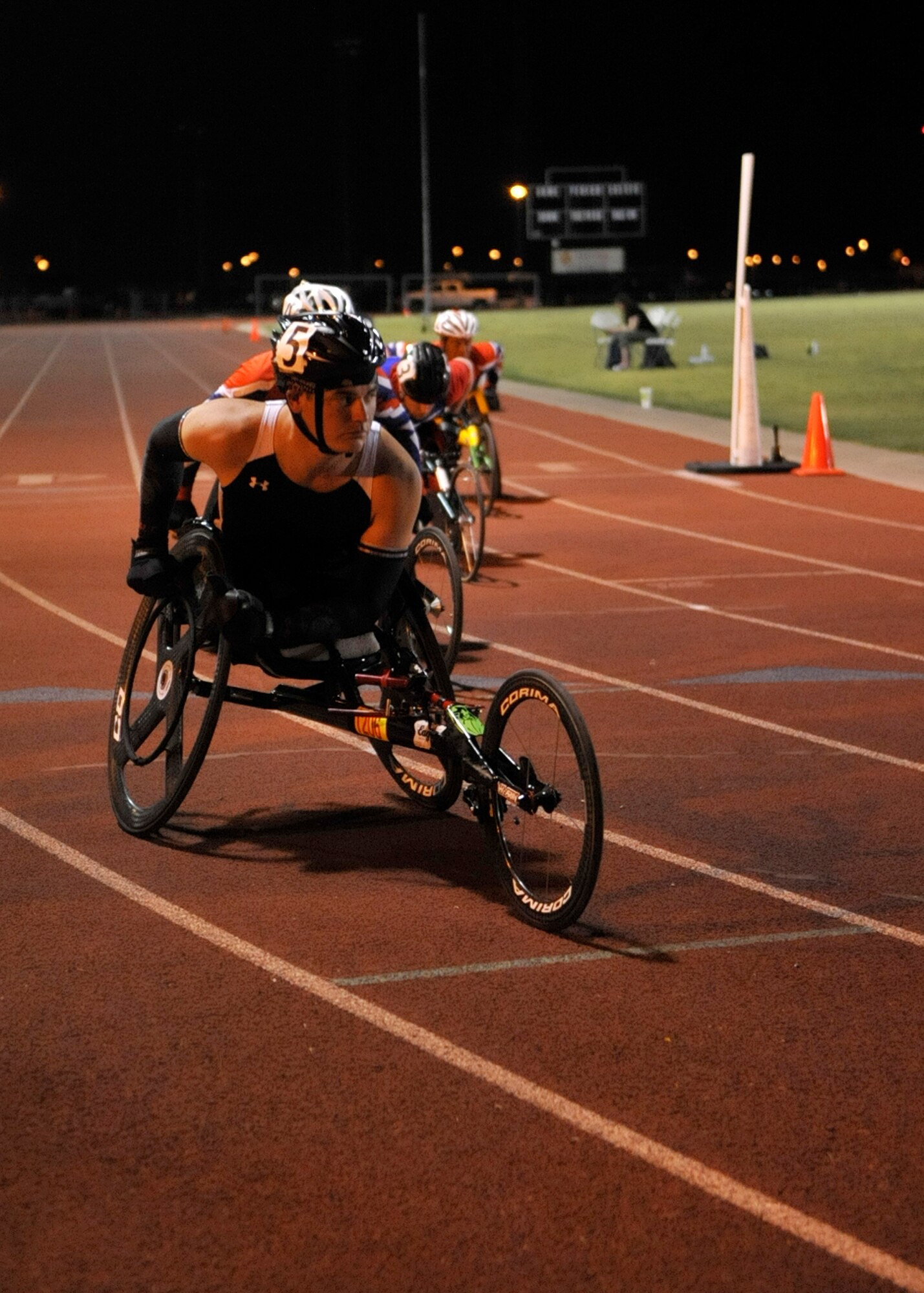 Marine Cpl. Ivan Sears waits at the starting line May 10, 2014, at Red Mountain High School in Mesa, Ariz. Sears competed in the 100 meter, 400 meter, and 800 meter events at the Paralympic Desert Challenge in Mesa, Ariz. Sears represents the Marine Corps during training but also works with wounded warrior families at Fort Sam Houston, San Antonio, Texas. (U.S. Air Force photo/Senior Airman Marcy Copeland)    