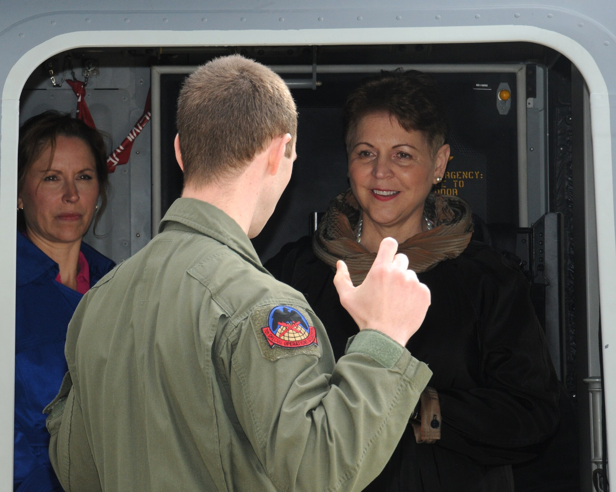 U.S. Air Force Staff Sgt. Francis Reddy, center, 7th Special Operations Squadron CV-22 special mission aviator from Selden, N.Y., speaks with The Honorable Jessica Wright, acting undersecretary of defense for personnel and readiness, May 14, 2014, on RAF Mildenhall, England. Wright toured the base with Team Mildenhall leadership and met Airmen who told her about their careers. In her state of Pennsylvania cabinet-level position, she was responsible for command, control and supervision of all Air and Army National Guard units allocated to the state of Pennsylvania, six state-owned veterans’ homes and programs for Pennsylvania’s 1 million veterans. (U.S. Air Force photo by Gina Randall/Released)