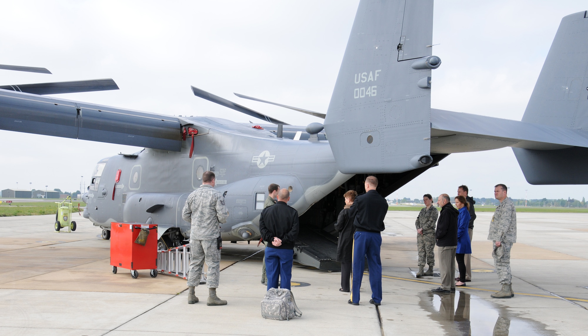 Members of Team Mildenhall speak with The Honorable Jessica Wright, acting undersecretary of defense for personnel and readiness, May 14, 2014, on RAF Mildenhall, England. Wright toured the base with Team Mildenhall leadership and met Airmen who told her about their careers. Her distinguished 35-year career of military service culminated in her final assignment as adjutant general of Pennsylvania and commander of the Pennsylvania Army National Guard. (U.S. Air Force photo by Gina Randall/Released)