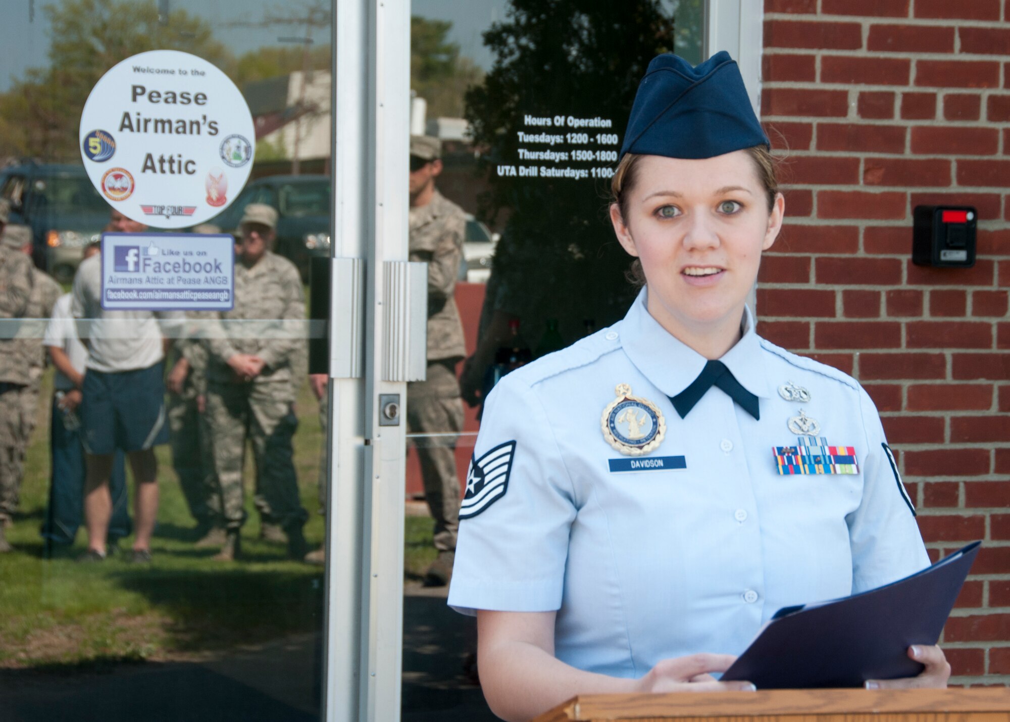 Tech Sgt. Jessica Davidson speaks during the grand opening of the Airman’s Attic, Pease Air National Guard Base, N.H. May 15, 2014.  (U.S. Air National Guard photo by Staff Sgt. Curtis J. Lenz)