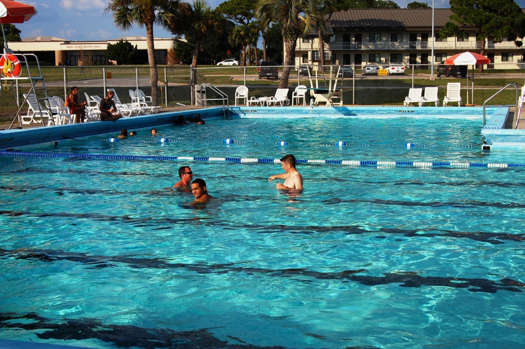 Members of Team Tyndall enjoy the base pool in the summer of 2012 during a Hearts Apart Pool Party. (U.S. Air Force courtesy photo)