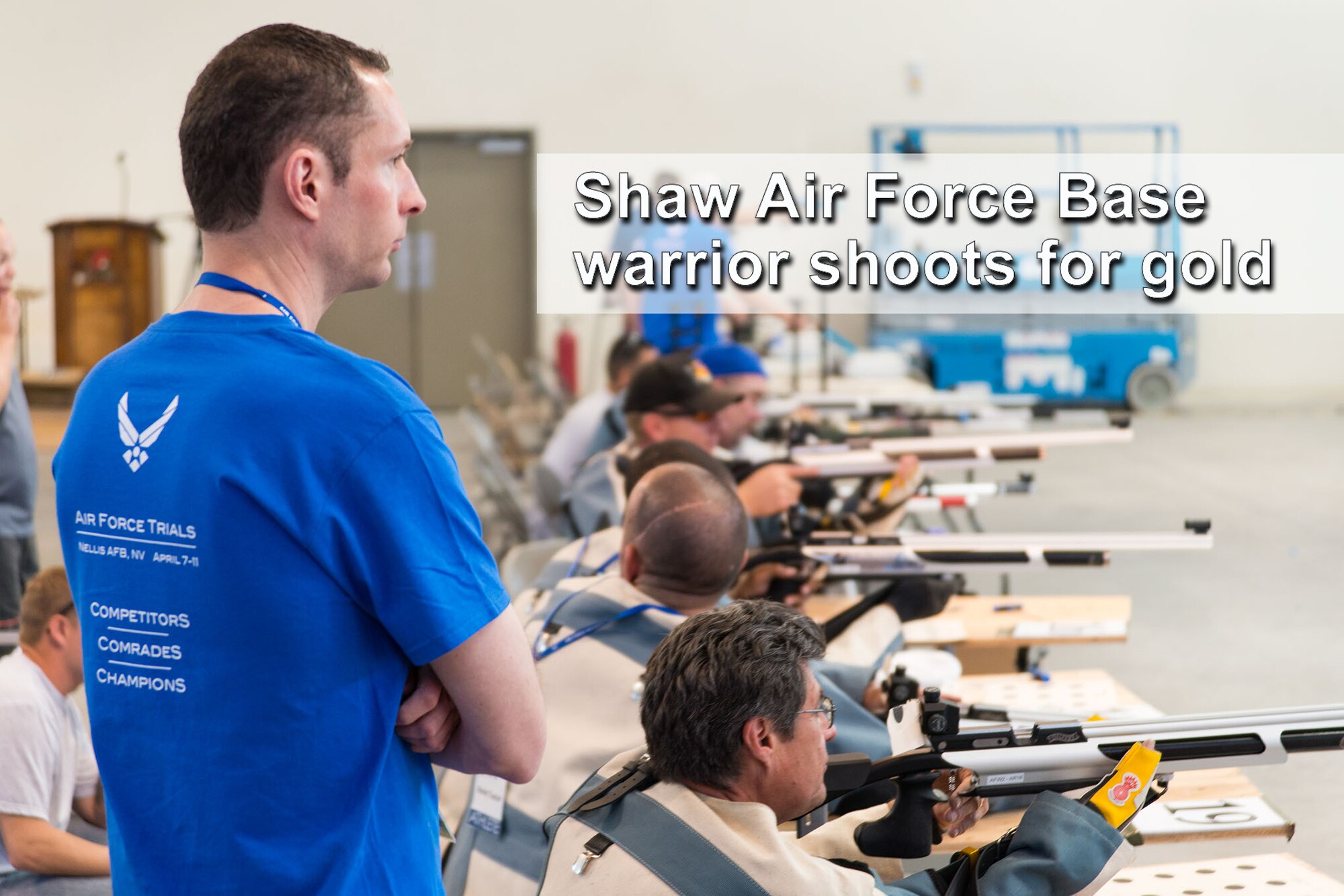 U.S. Air Force Special Agent Robert Davis, Office of Special Investigations Detachment 212 commander, watches a preliminary round of shooting events for the inaugural Air Force Wounded Warrior Trials at Nellis Air Force Base, Nev., April 2014. Davis volunteered to coach the shooting events for the Warrior Games which takes place September 28 through October 4. (Courtesy Photo/Released)
