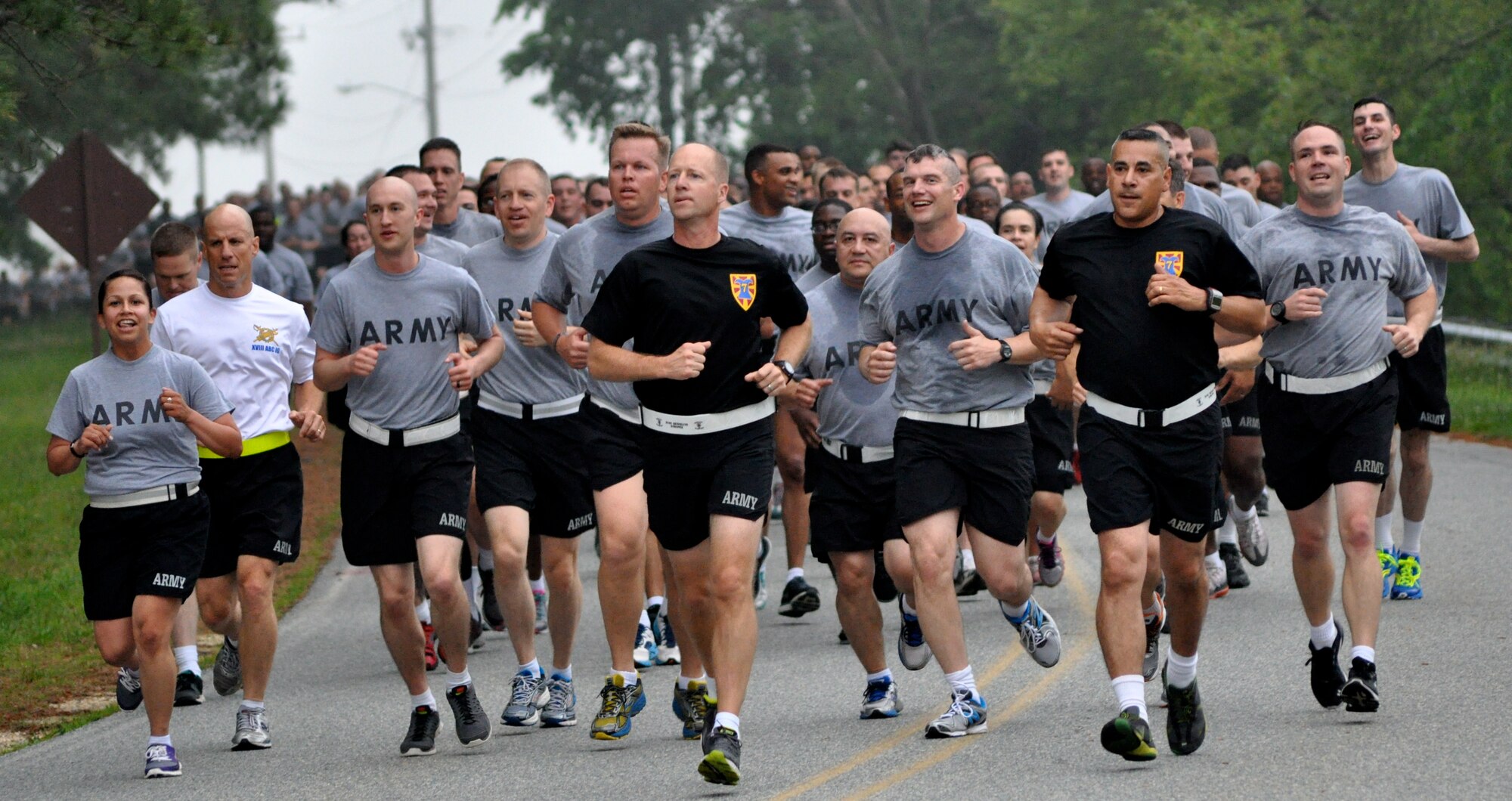 U.S. Army Col. Randy Nelson, 7th Transportation Brigade (Expeditionary) commander, leads Soldiers during the “4x36” run at Fort Eustis, Va., May 14, 2014. The “4x36” is a 4-mile run that has to be completed in 36 minutes or less, and is part of the Organizational Readiness Assessment, an annual inspection from XVIII Airborne Corps. (U.S. Army photo by Sgt. Stefanie Warner/Released)