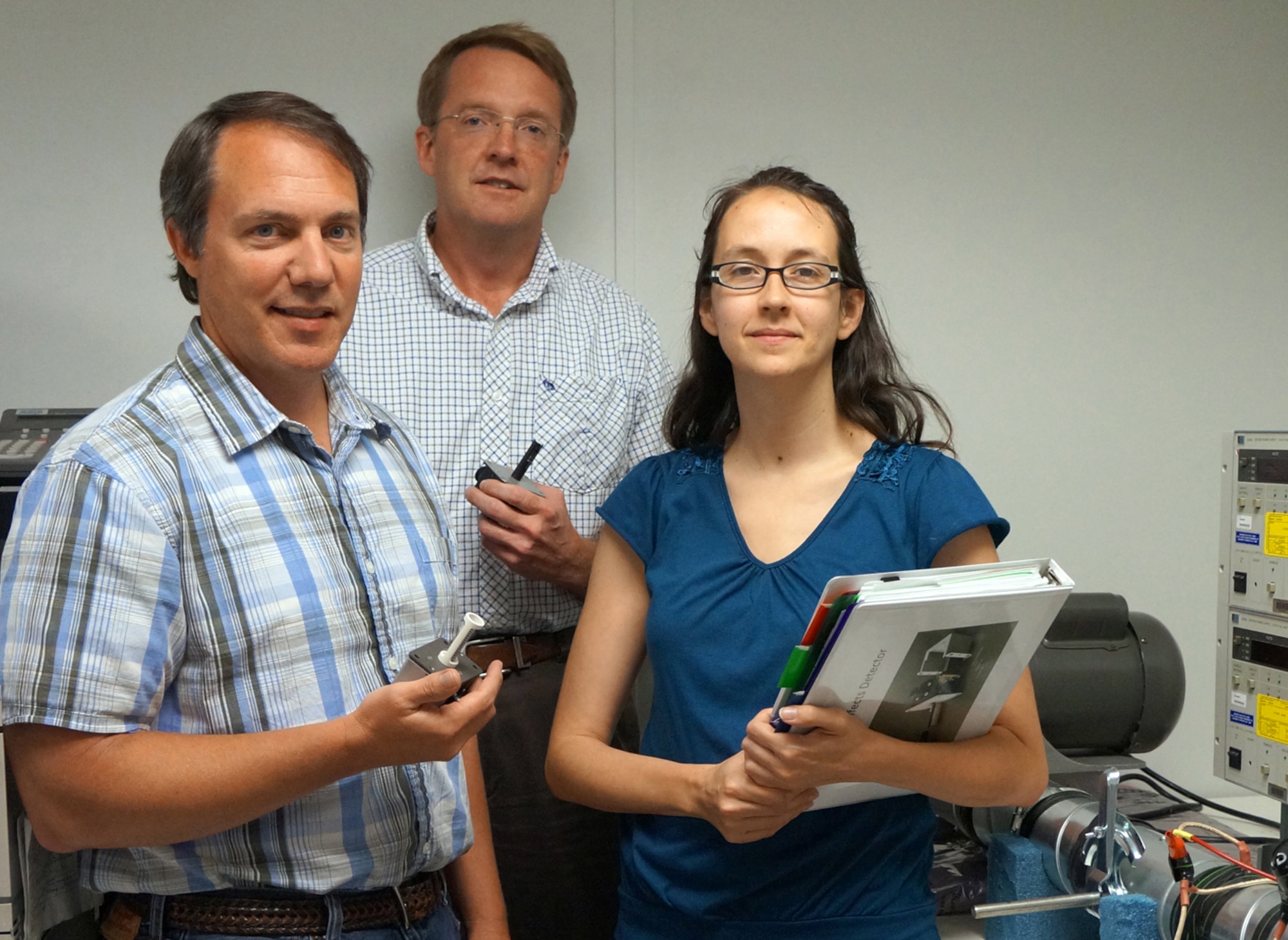 Rob O’Quinn, 402nd Electronics Maintenance Group mechanical engineer; Karl Zack, 402nd EMXG electrical engineer; and Joan Santillan, Reverse Engineering program manager; specialize in creating organic repair capabilities at Robins. (U.S. Air Force photo by Ed Aspera)