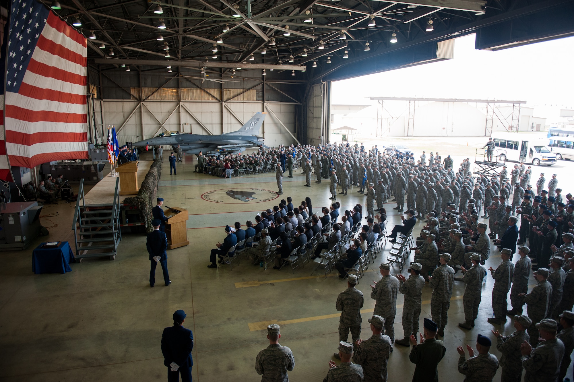 Members of the Wolf Pack attend the 8th Fighter Wing change of command ceremony at Kunsan Air Base, Republic of Korea, May 16, 2014. Col. S. Clinton Hinote relinquished command to Col. Kenneth Ekman. (U.S. Air Force photo by Staff Sgt. Clayton Lenhardt/Released)
