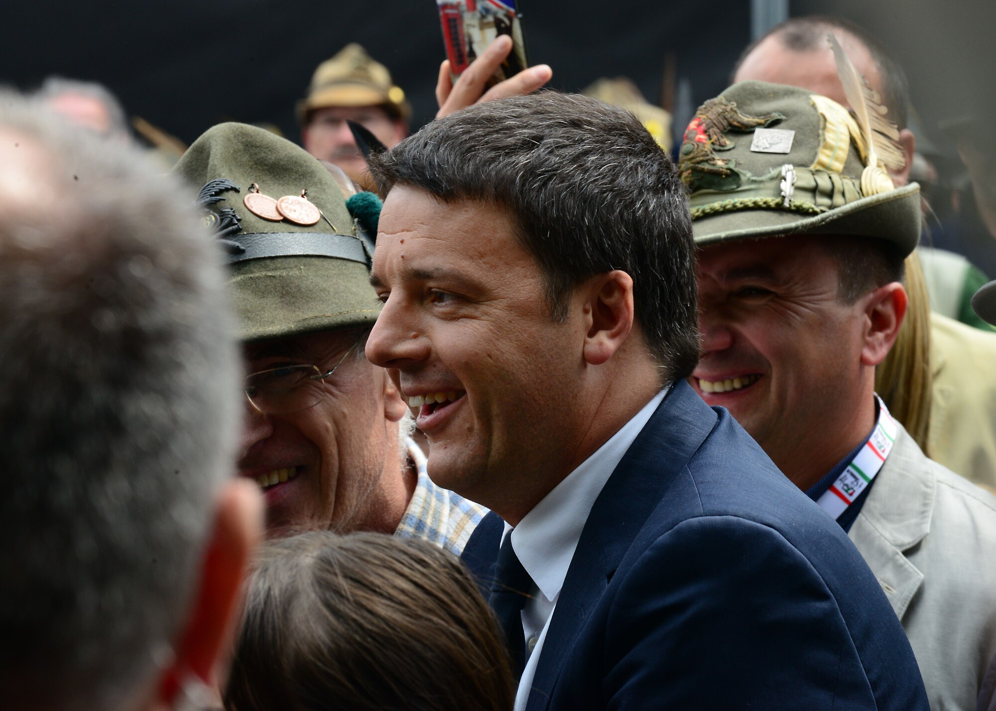 Italian Prime Minister Matteo Renzi arrives at the Alpini parade, May 11, 2014, in downtown Pordenone, Italy. To commemorate the annual gathering of Alpini mountain soliders, several marching bands played and the Italian aerial acrobatics team, Frecce Tricolore, performed a flyover for the approximate 400,000 individuals in attendance.  (U.S. Air Force photo/Airman 1st Class Ryan Conroy) 