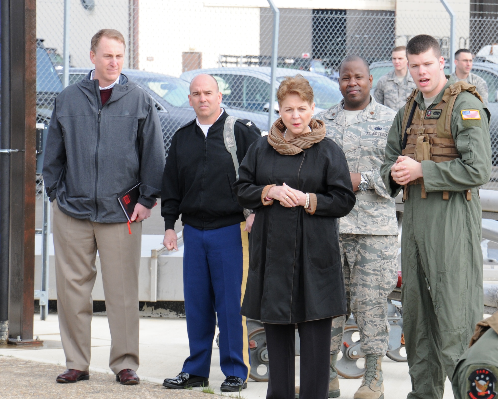 U.S. Air Force Airman 1st Class Thomas Mahoney, right, 100th Logistics Readiness Squadron Forward Area Refueling Point team member from Newark, Del., speaks with The Honorable Jessica Wright, acting undersecretary of defense for personnel and readiness, May 14, 2014, on RAF Mildenhall, England. Wright toured the base with Team Mildenhall leadership and met Airmen who told her about their careers. Wright retired as a major general in the Pennsylvania Army National Guard. (U.S. Air Force photo by Gina Randall/Released)