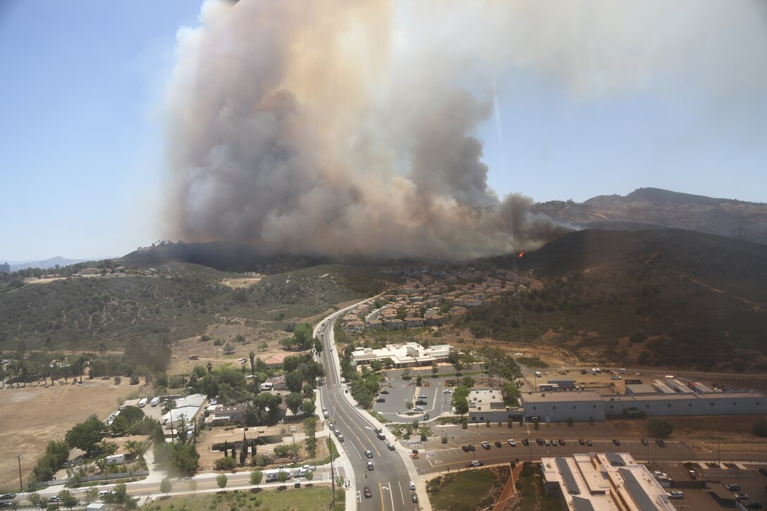 The Cocos wildfire burns near Marine Base Camp Pendleton, Calif., May 15, 2014. Marines are providing aerial assistance to the California Department of Forestry and Fire Protection in fighting wildfires burning across San Diego county. Marines assigned to the 3rd Marine Aircraft Wing have partnered with the California Department of Forestry and Fire Protection to conduct aerial firefighting against several wildfires ablaze in San Diego County. 