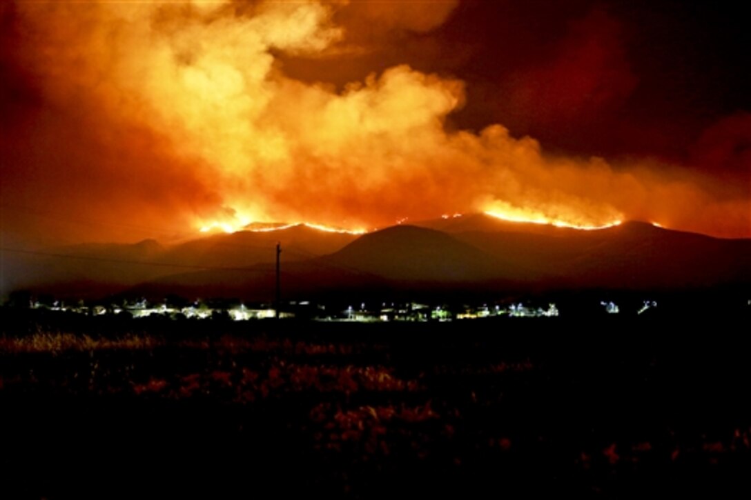 May 15, 2014. The Tomahawk fire, in the northeast section of Camp Pendleton, has burned more than 6,000 acres, forcing evacuations of housing areas on base and various schools on and off base. Aircraft from 3rd Marine Aircraft Wing and the Camp Pendleton Fire Department worked with state officials to prevent fires from spreading off base.