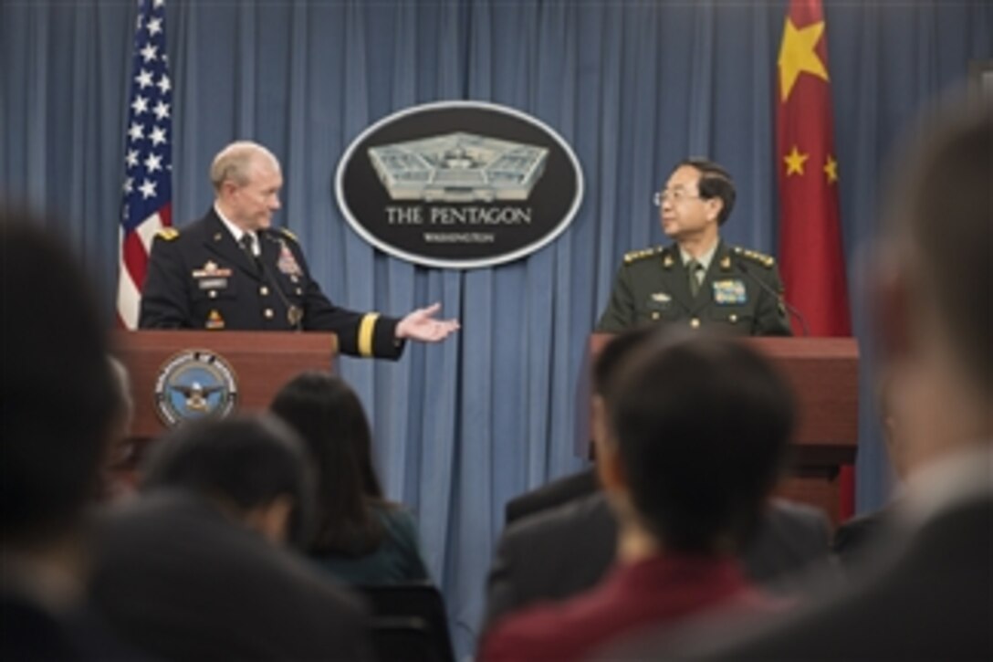 U.S. Army Gen. Martin E. Dempsey, left, chairman of the Joint Chiefs of Staff, and Chinese Army Gen. Fang Fenghui, chief of the general staff, hold a press conference at the Pentagon, May 15, 2014.