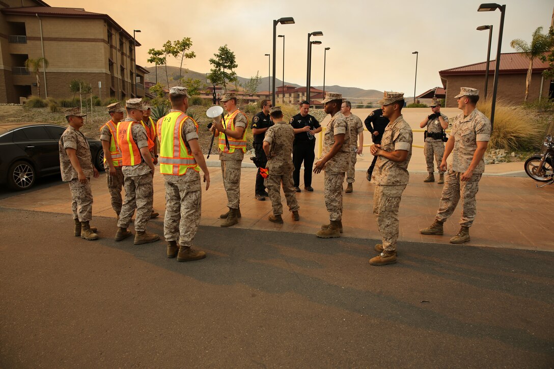 The School of Infantry-West (52 Area) evacuation order has been lifted. All personnel can return via the I-5 and Basilone Rd. gate to the 52 Area.

The San Mateo Fire (Combat Fire) that was reported at 11:24 a.m. Friday has burned 1,000 acres and is currently listed as 25% contained. The Las Pulgas fire first reported at 3:15 p.m. Thursday has burned 15,000 acres and is listed at 40% containment.  The Tomahawk fire that started Wednesday on Naval Weapons Station Fallbrook is currently listed at 6,500 acres burned and 75% containment.

Evacuation orders for Camp San Mateo (62 Area), Camp Las Pulgas (43 Area), Camp Las Flores (41 Area), Camp Margarita (33 Area), Marine Air Support Squadron 3 (32 Area) and Camp Vado Del Rio (25 Area) remain in effect.

Road Closures:

The Las Pulgas gate and Las Pulgas Road remain closed to all traffic except emergency vehicles.

The Christianitos Gate is closed to all traffic except emergency vehicles.

The San Mateo Road between Camp San Mateo and Camp San Onofre is closed.

The Naval Weapons Station Fallbrook gate and Ammunition Road remain closed.

Basilone Road from Marine Corps Air Station Camp Pendleton to Camp Horno remains closed.

Stuart Mesa Road north of Assault Craft Unit-5 to the Las Pulgas Gate remains closed.

The causes of the fires are under investigation.
