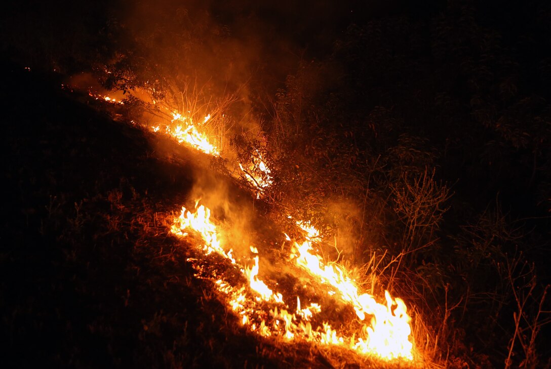 The School of Infantry-West (52 Area) evacuation order has been lifted. All personnel can return via the I-5 and Basilone Rd. gate to the 52 Area.

The San Mateo Fire (Combat Fire) that was reported at 11:24 a.m. Friday has burned 1,000 acres and is currently listed as 25% contained. The Las Pulgas fire first reported at 3:15 p.m. Thursday has burned 15,000 acres and is listed at 40% containment.  The Tomahawk fire that started Wednesday on Naval Weapons Station Fallbrook is currently listed at 6,500 acres burned and 75% containment.

Evacuation orders for Camp San Mateo (62 Area), Camp Las Pulgas (43 Area), Camp Las Flores (41 Area), Camp Margarita (33 Area), Marine Air Support Squadron 3 (32 Area) and Camp Vado Del Rio (25 Area) remain in effect.

Road Closures:

The Las Pulgas gate and Las Pulgas Road remain closed to all traffic except emergency vehicles.

The Christianitos Gate is closed to all traffic except emergency vehicles.

The San Mateo Road between Camp San Mateo and Camp San Onofre is closed.

The Naval Weapons Station Fallbrook gate and Ammunition Road remain closed.

Basilone Road from Marine Corps Air Station Camp Pendleton to Camp Horno remains closed.

Stuart Mesa Road north of Assault Craft Unit-5 to the Las Pulgas Gate remains closed.

The causes of the fires are under investigation.

