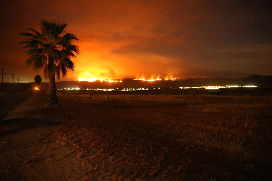 The School of Infantry-West (52 Area) evacuation order has been lifted. All personnel can return via the I-5 and Basilone Rd. gate to the 52 Area.

The San Mateo Fire (Combat Fire) that was reported at 11:24 a.m. Friday has burned 1,000 acres and is currently listed as 25% contained. The Las Pulgas fire first reported at 3:15 p.m. Thursday has burned 15,000 acres and is listed at 40% containment.  The Tomahawk fire that started Wednesday on Naval Weapons Station Fallbrook is currently listed at 6,500 acres burned and 75% containment.

Evacuation orders for Camp San Mateo (62 Area), Camp Las Pulgas (43 Area), Camp Las Flores (41 Area), Camp Margarita (33 Area), Marine Air Support Squadron 3 (32 Area) and Camp Vado Del Rio (25 Area) remain in effect.

Road Closures:

The Las Pulgas gate and Las Pulgas Road remain closed to all traffic except emergency vehicles.

The Christianitos Gate is closed to all traffic except emergency vehicles.

The San Mateo Road between Camp San Mateo and Camp San Onofre is closed.

The Naval Weapons Station Fallbrook gate and Ammunition Road remain closed.

Basilone Road from Marine Corps Air Station Camp Pendleton to Camp Horno remains closed.

Stuart Mesa Road north of Assault Craft Unit-5 to the Las Pulgas Gate remains closed.

The causes of the fires are under investigation.
