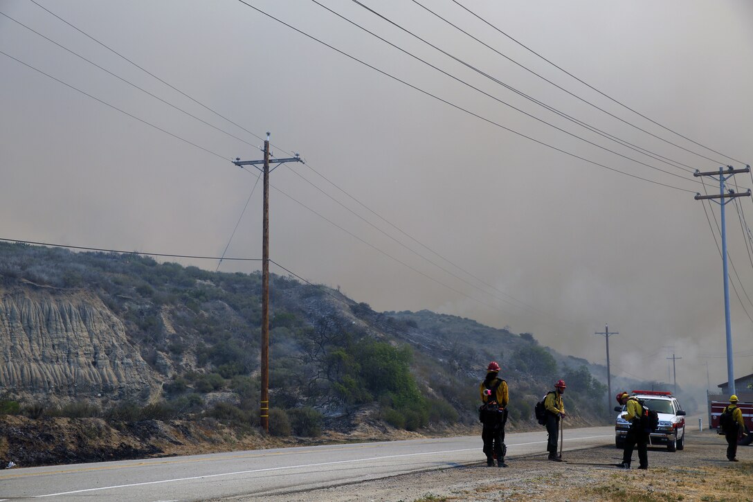The School of Infantry-West (52 Area) evacuation order has been lifted. All personnel can return via the I-5 and Basilone Rd. gate to the 52 Area.

The San Mateo Fire (Combat Fire) that was reported at 11:24 a.m. Friday has burned 1,000 acres and is currently listed as 25% contained. The Las Pulgas fire first reported at 3:15 p.m. Thursday has burned 15,000 acres and is listed at 40% containment.  The Tomahawk fire that started Wednesday on Naval Weapons Station Fallbrook is currently listed at 6,500 acres burned and 75% containment.

Evacuation orders for Camp San Mateo (62 Area), Camp Las Pulgas (43 Area), Camp Las Flores (41 Area), Camp Margarita (33 Area), Marine Air Support Squadron 3 (32 Area) and Camp Vado Del Rio (25 Area) remain in effect.

Road Closures:

The Las Pulgas gate and Las Pulgas Road remain closed to all traffic except emergency vehicles.

The Christianitos Gate is closed to all traffic except emergency vehicles.

The San Mateo Road between Camp San Mateo and Camp San Onofre is closed.

The Naval Weapons Station Fallbrook gate and Ammunition Road remain closed.

Basilone Road from Marine Corps Air Station Camp Pendleton to Camp Horno remains closed.

Stuart Mesa Road north of Assault Craft Unit-5 to the Las Pulgas Gate remains closed.

The causes of the fires are under investigation.

