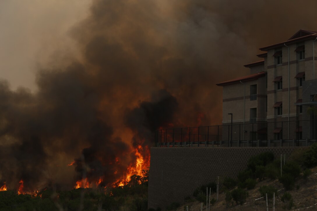 The School of Infantry-West (52 Area) evacuation order has been lifted. All personnel can return via the I-5 and Basilone Rd. gate to the 52 Area.

The San Mateo Fire (Combat Fire) that was reported at 11:24 a.m. Friday has burned 1,000 acres and is currently listed as 25% contained. The Las Pulgas fire first reported at 3:15 p.m. Thursday has burned 15,000 acres and is listed at 40% containment.  The Tomahawk fire that started Wednesday on Naval Weapons Station Fallbrook is currently listed at 6,500 acres burned and 75% containment.

Evacuation orders for Camp San Mateo (62 Area), Camp Las Pulgas (43 Area), Camp Las Flores (41 Area), Camp Margarita (33 Area), Marine Air Support Squadron 3 (32 Area) and Camp Vado Del Rio (25 Area) remain in effect.

Road Closures:

The Las Pulgas gate and Las Pulgas Road remain closed to all traffic except emergency vehicles.

The Christianitos Gate is closed to all traffic except emergency vehicles.

The San Mateo Road between Camp San Mateo and Camp San Onofre is closed.

The Naval Weapons Station Fallbrook gate and Ammunition Road remain closed.

Basilone Road from Marine Corps Air Station Camp Pendleton to Camp Horno remains closed.

Stuart Mesa Road north of Assault Craft Unit-5 to the Las Pulgas Gate remains closed.

The causes of the fires are under investigation.
