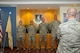 Members of the 108th Wing Inspector General office are coined by Maj. Gen. Craig N. Gourley, Deputy Inspector General of the Air Force, Office of the Secretary of the Air Force, for their exhaustive work for the upcoming Unit Evaluation Inspection and implementation of the Air Force inspection system at Joint Base McGuire-Dix-Lakehurst, N.J, May 16, 2014. Gourley challenged the IG team to continue to make things better for the Airmen of the 108th WG. (U.S. Air National Guard photo by Senior Airman Kellyann Novak/Released)